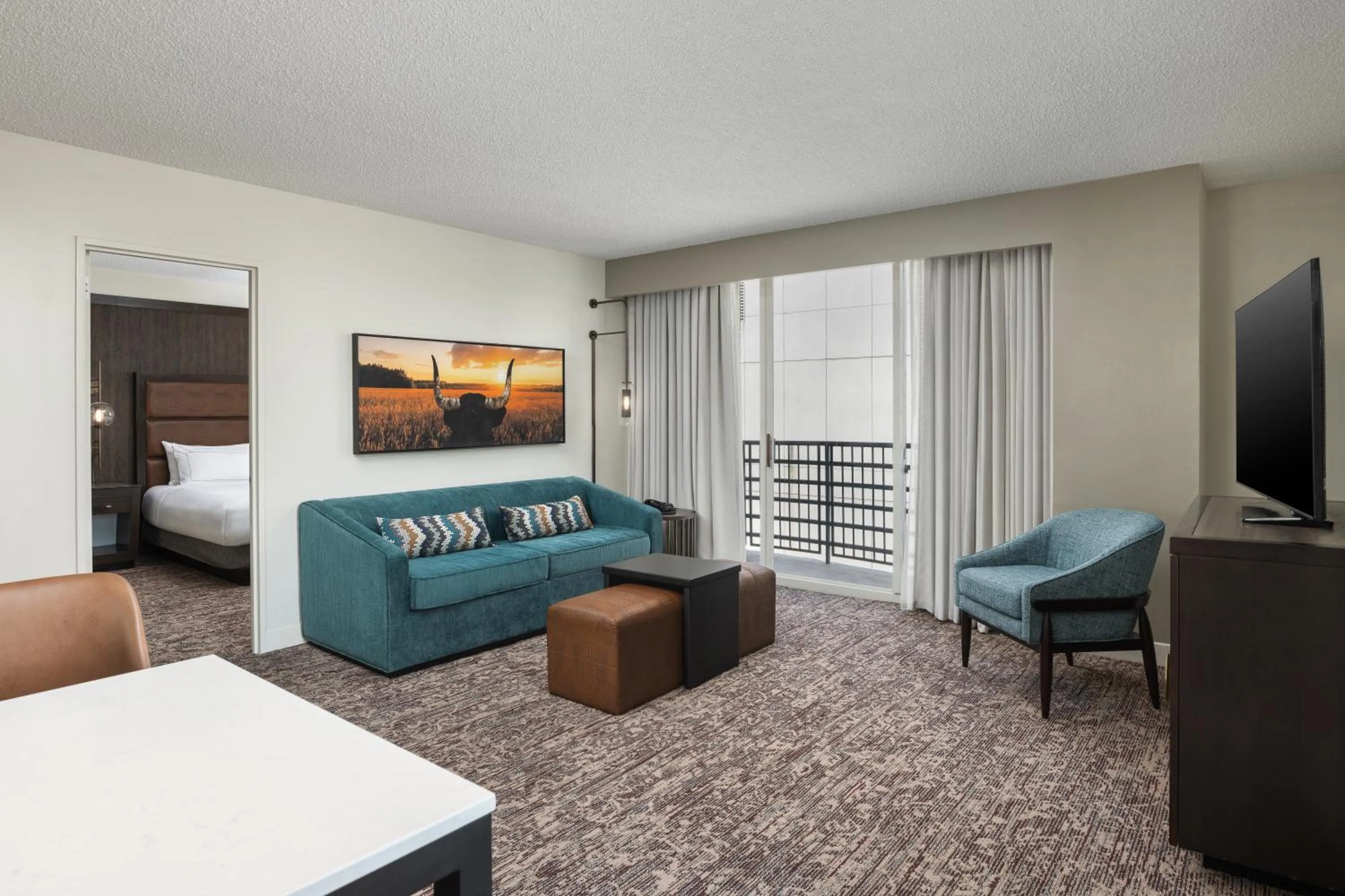 Living room, Bed in DoubleTree Suites by Hilton Austin Downtown Capitol