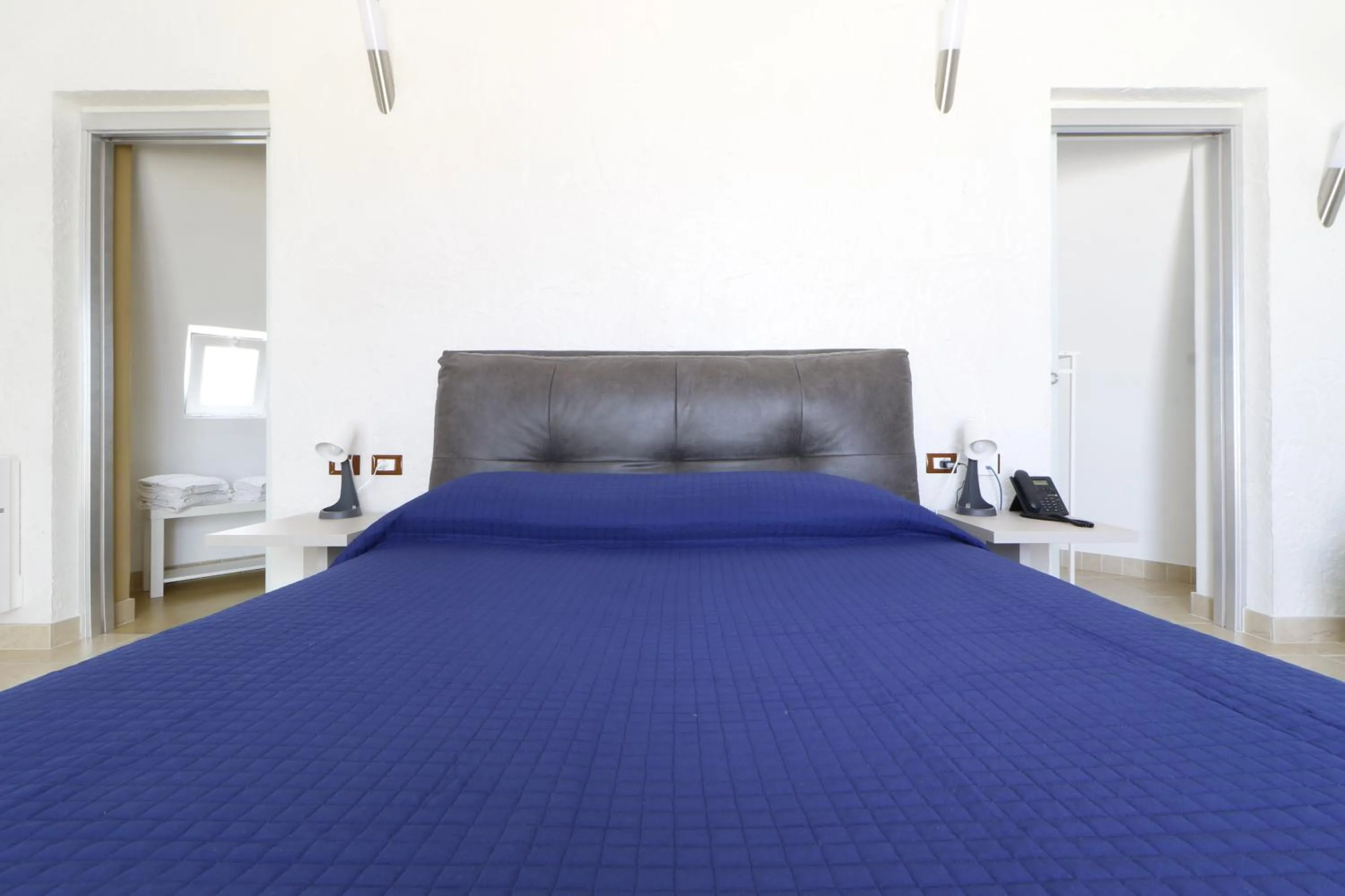 Bed in Hotel Capo Campolato