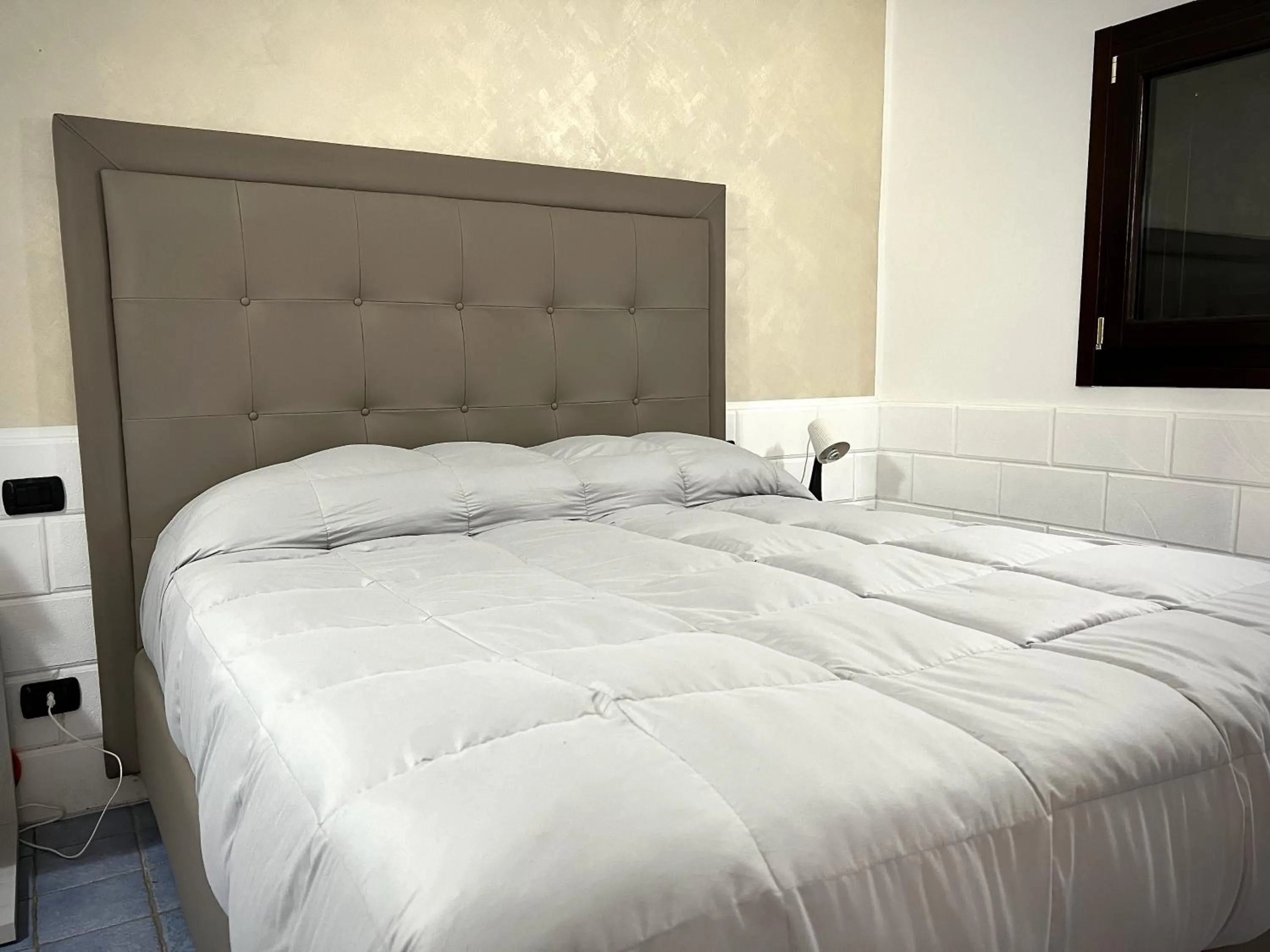 Bed in Hotel Capo Campolato