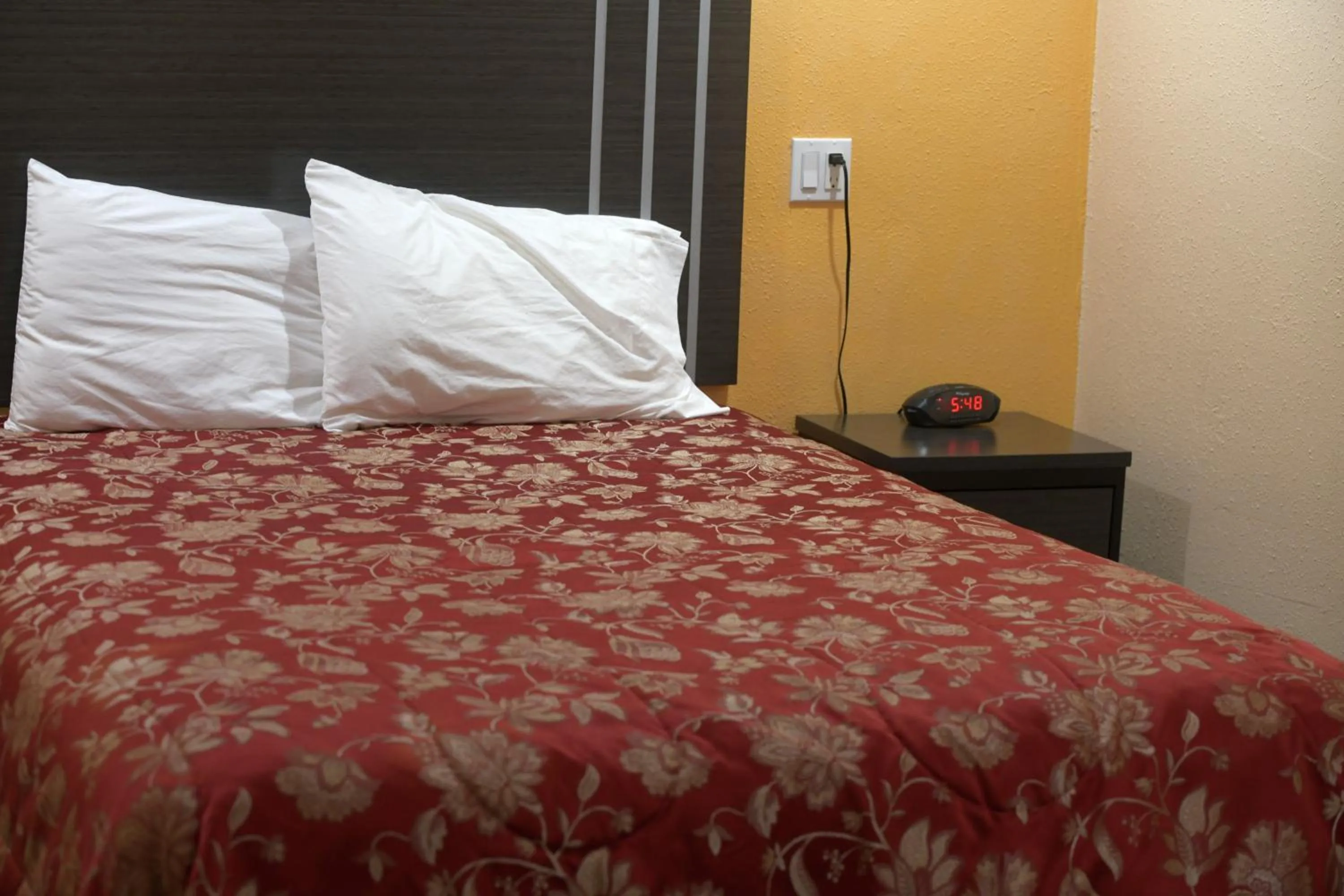 Bed in A-1 Budget Motel