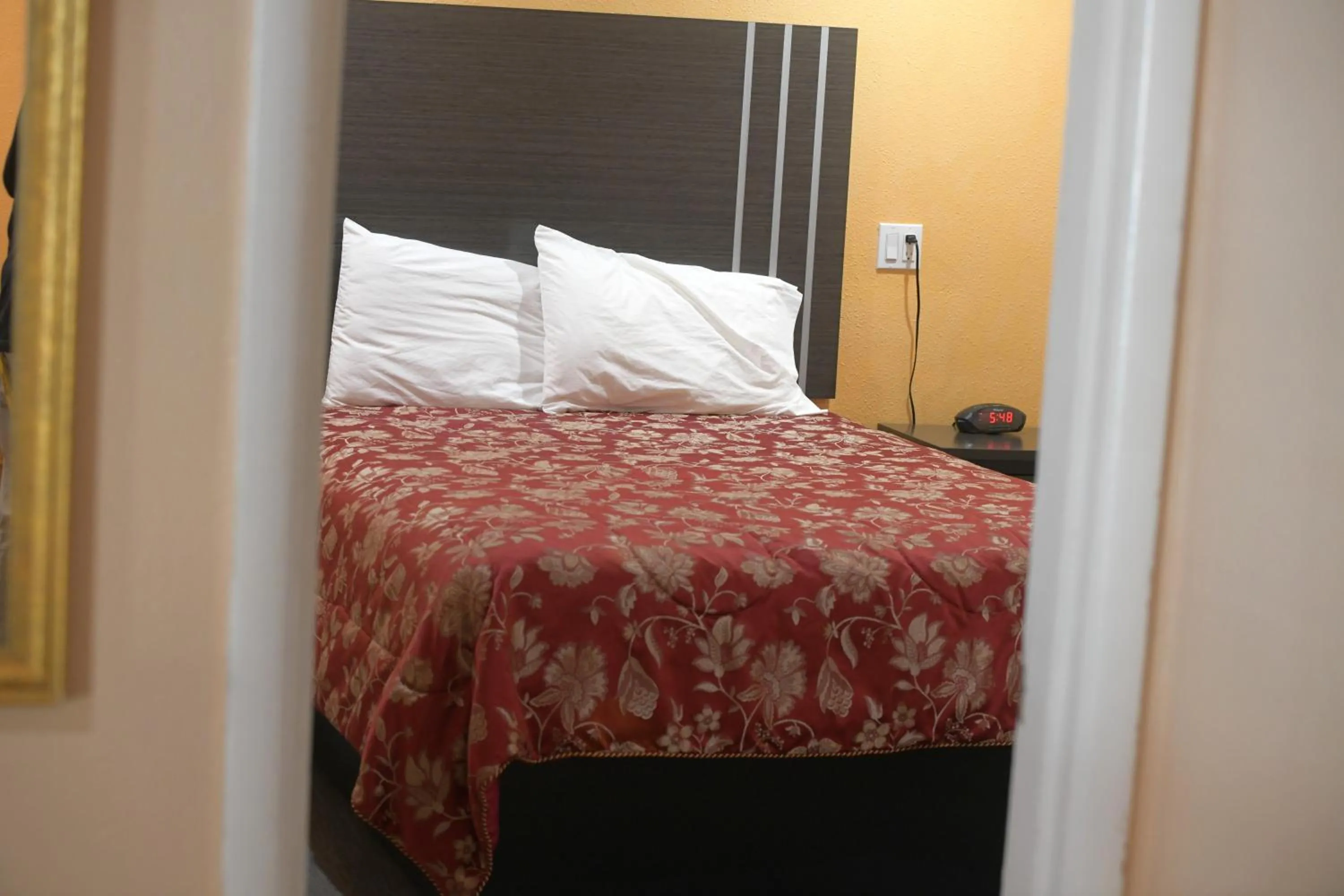 Bed in A-1 Budget Motel