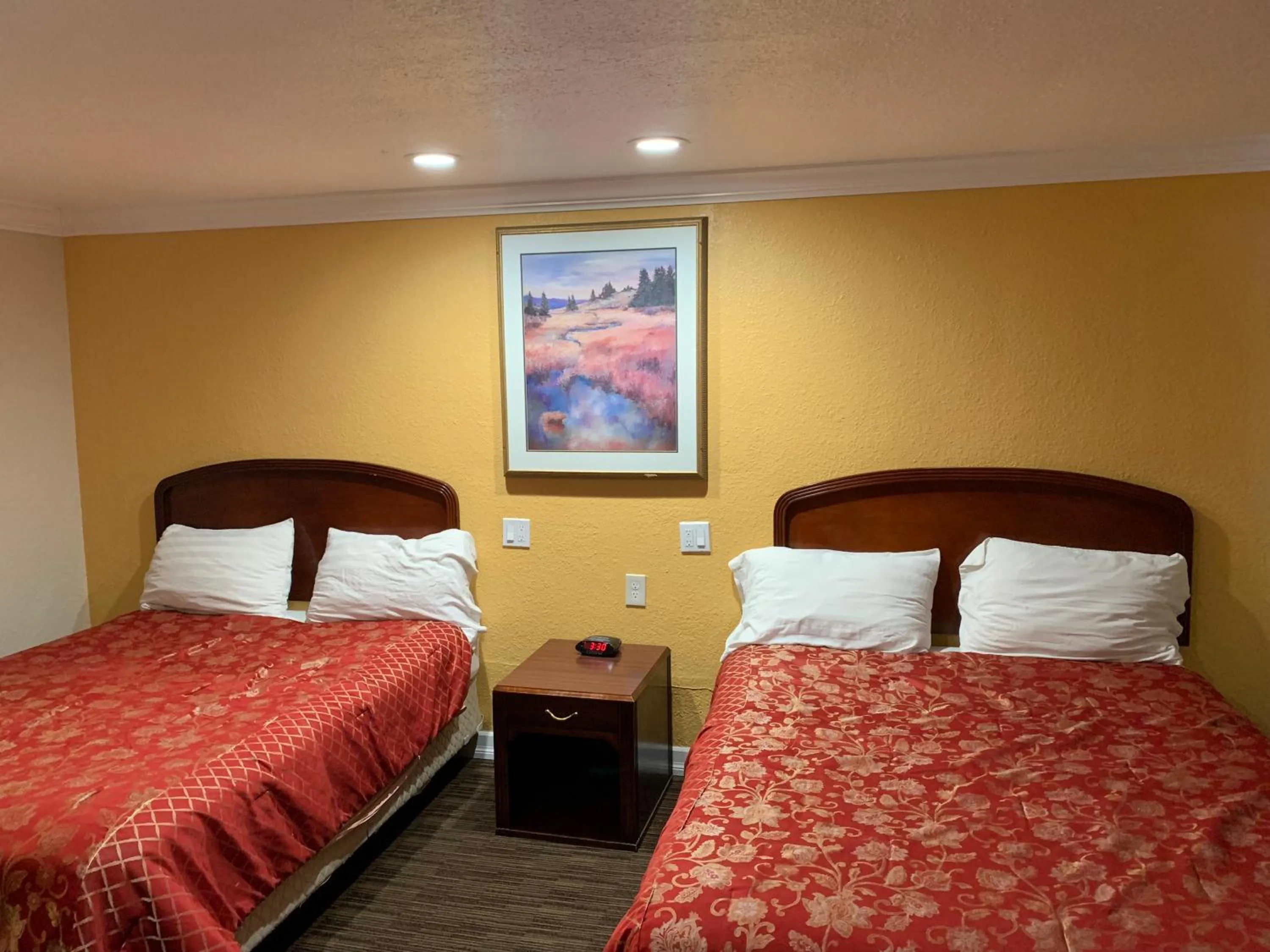 Bed in A-1 Budget Motel