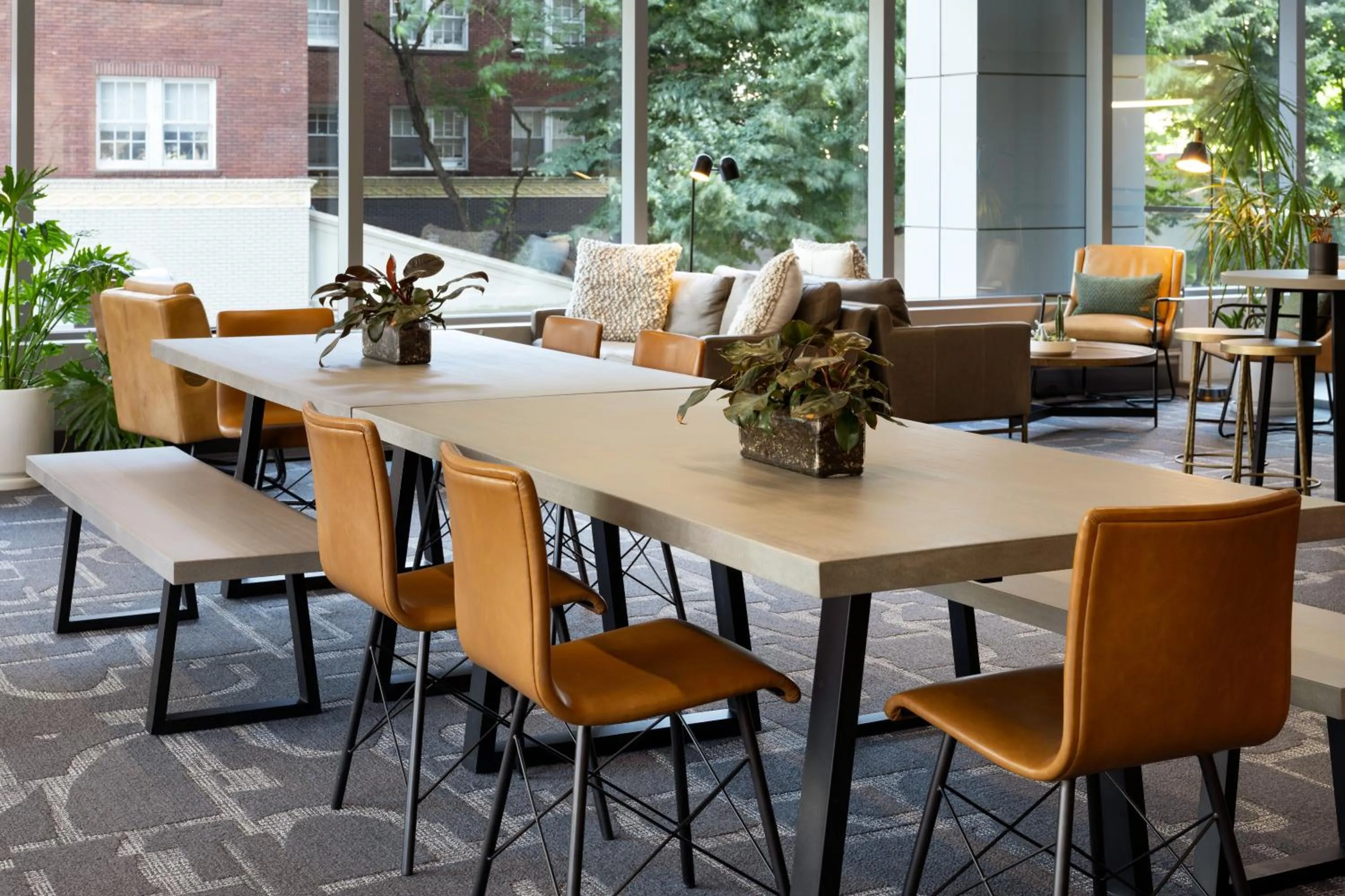 Communal lounge/ TV room in Hotel Vance, Portland, a Tribute Portfolio Hotel