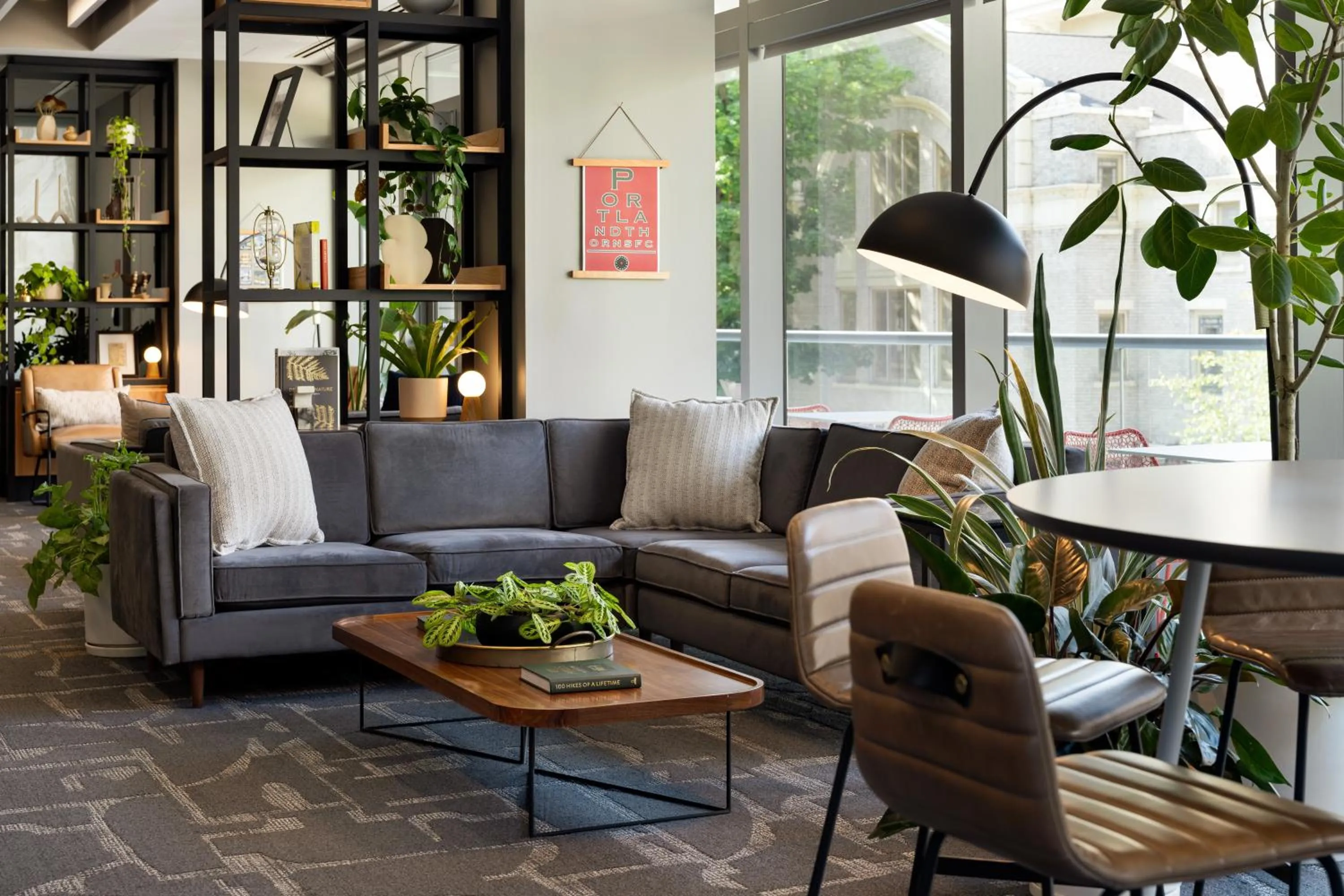 Communal lounge/ TV room in Hotel Vance, Portland, a Tribute Portfolio Hotel