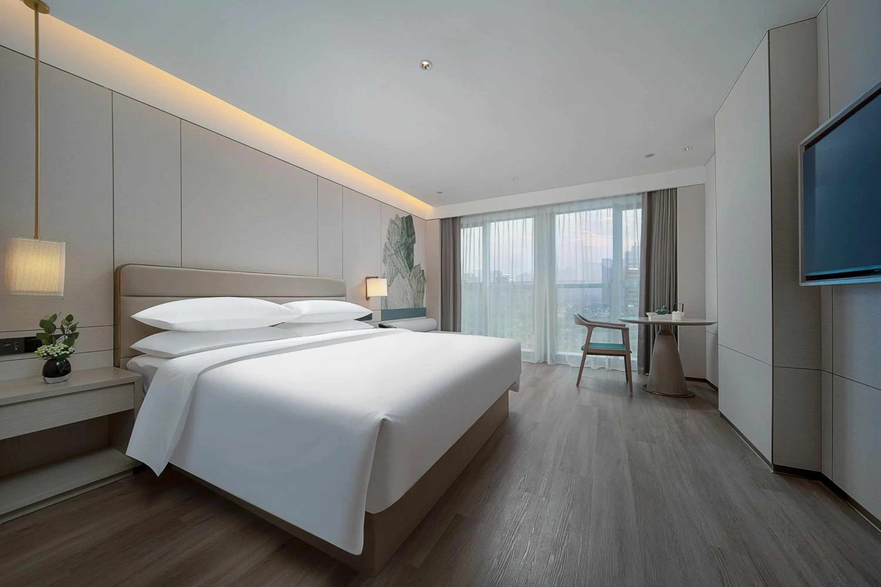 Bed in Manju Hotel Shaoxing Keqiao Wanda