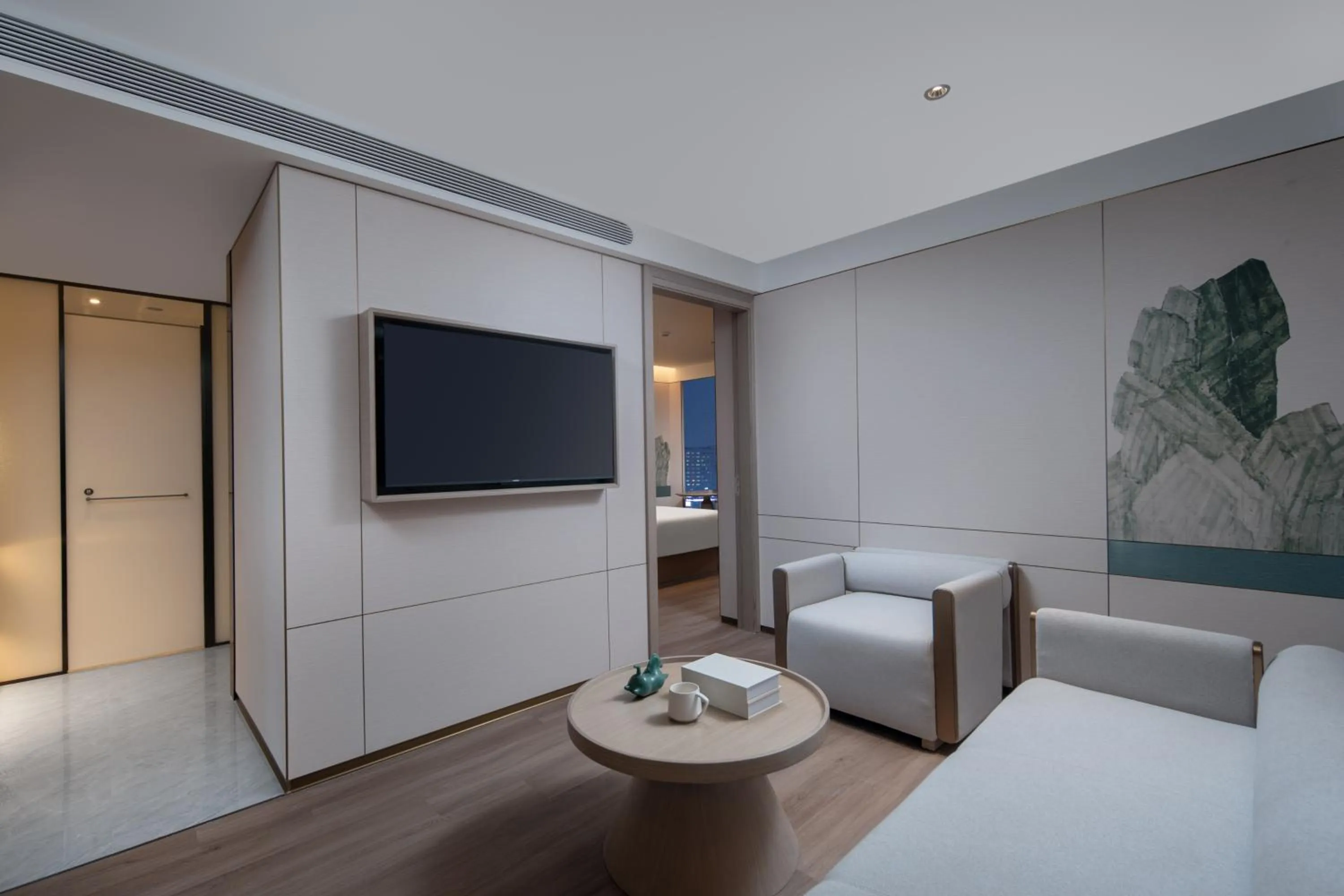 Communal lounge/ TV room in Manju Hotel Shaoxing Keqiao Wanda