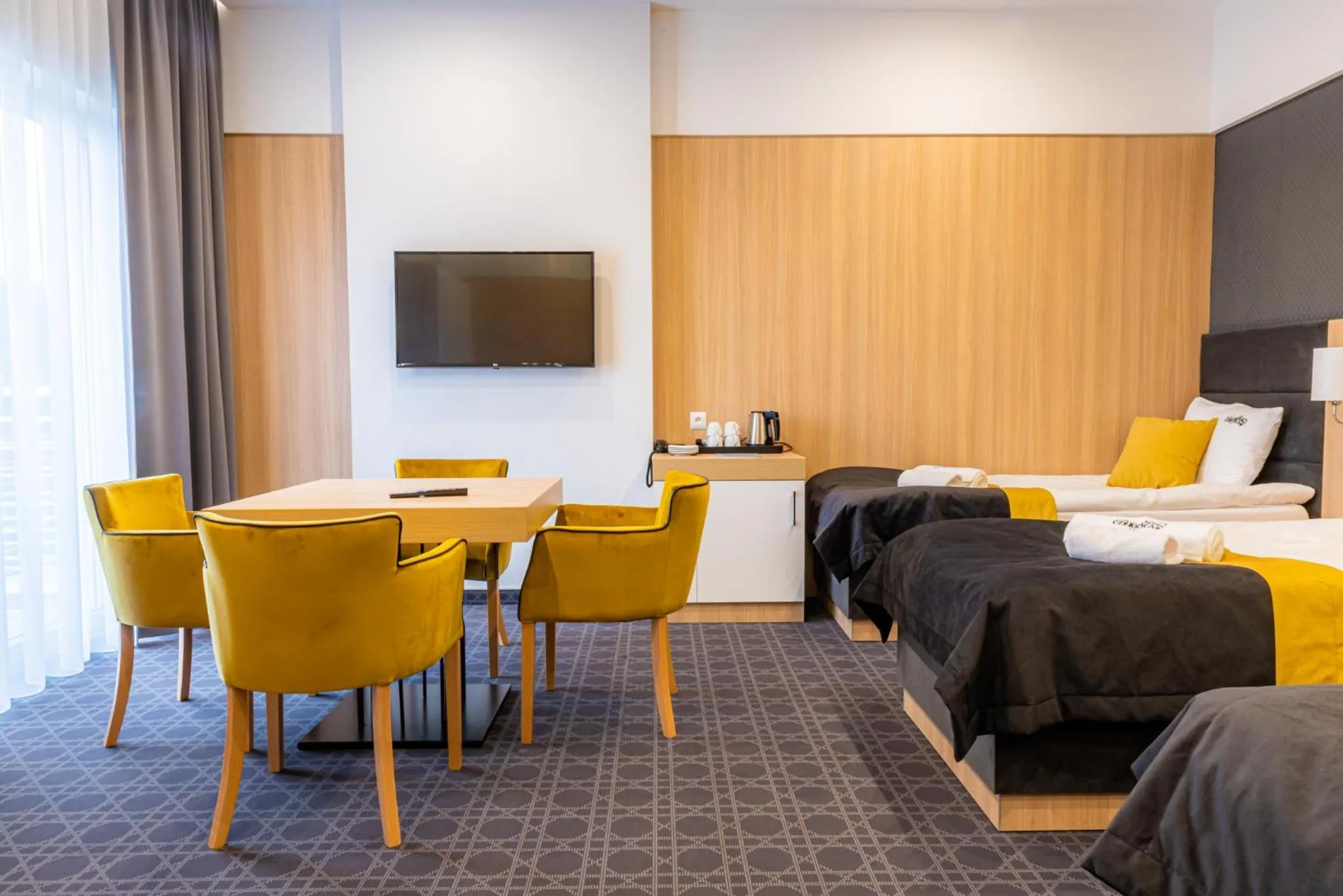 Communal lounge/ TV room, Bed in Hotel Nad Czernicą