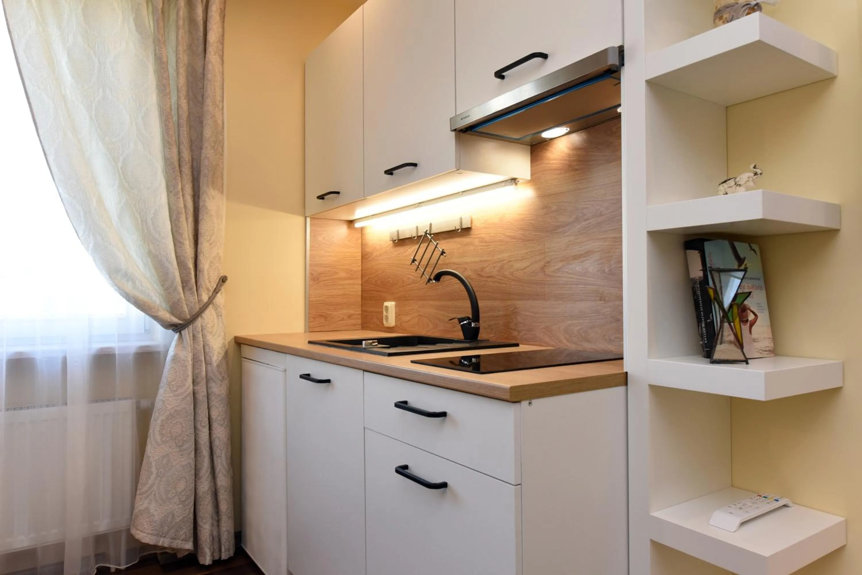 Kitchen or kitchenette in Vila Gilė