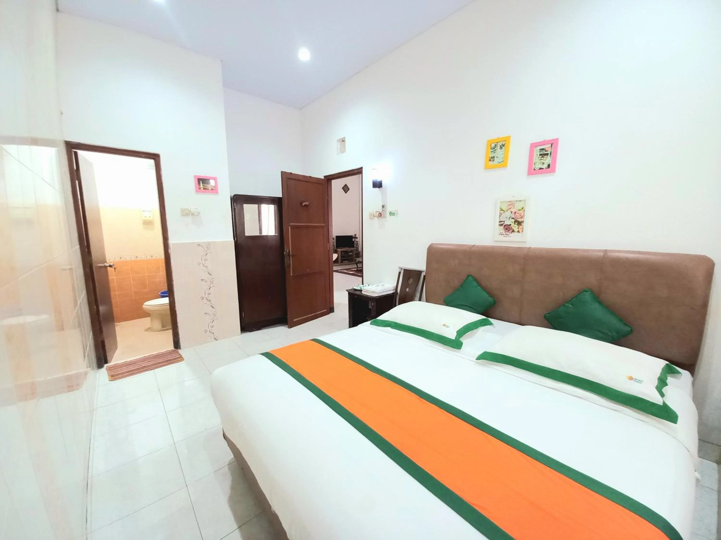 Bed in Homestay Jogja Dekat Taman Pelangi by Simply Homy
