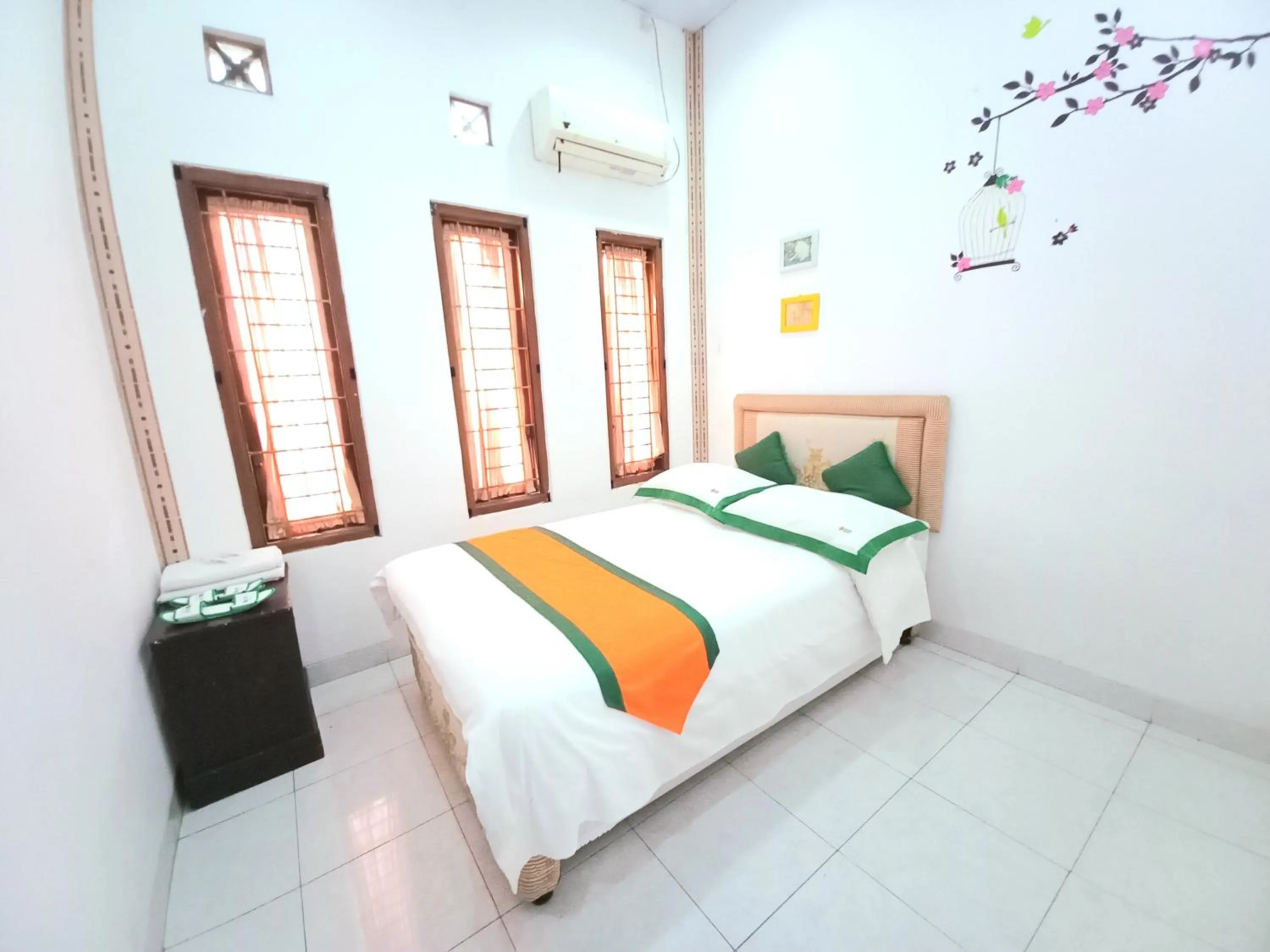 Bed in Homestay Jogja Dekat Taman Pelangi by Simply Homy