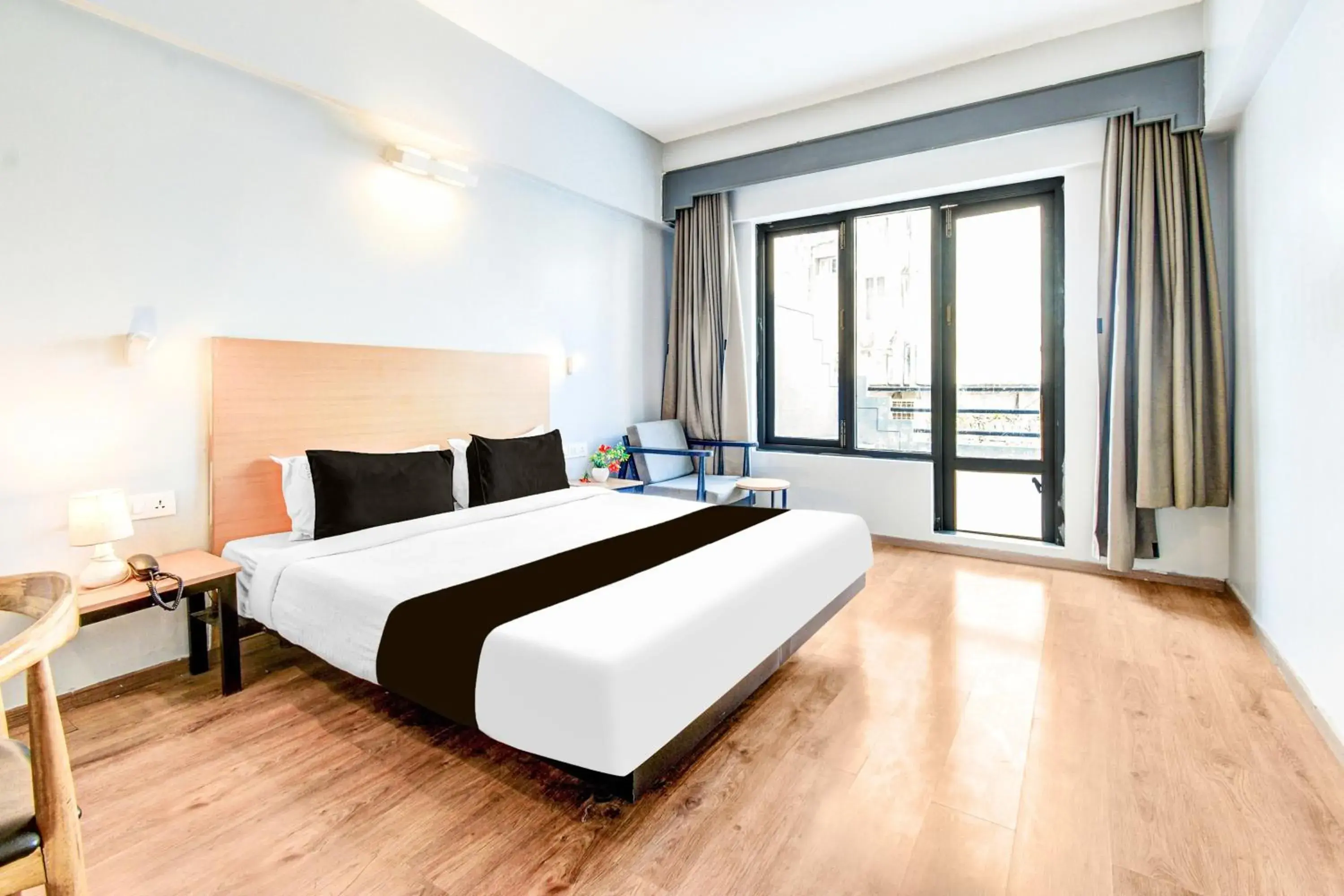 Classic Triple Room - single occupancy in Super Townhouse Lakdikapul Classic Triple Room - single occupancy in Super Townhouse Lakdikapul