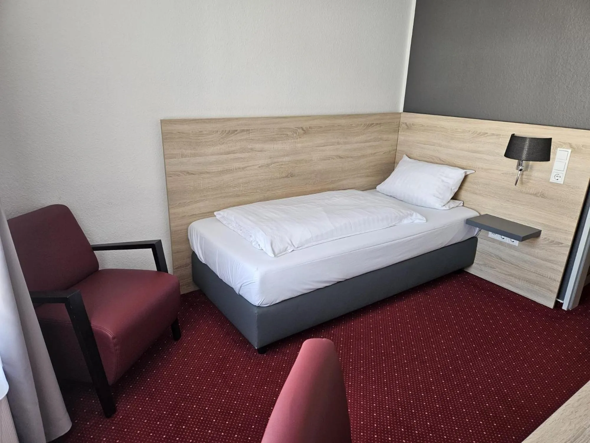 Bed in Hotel Deutsches Haus