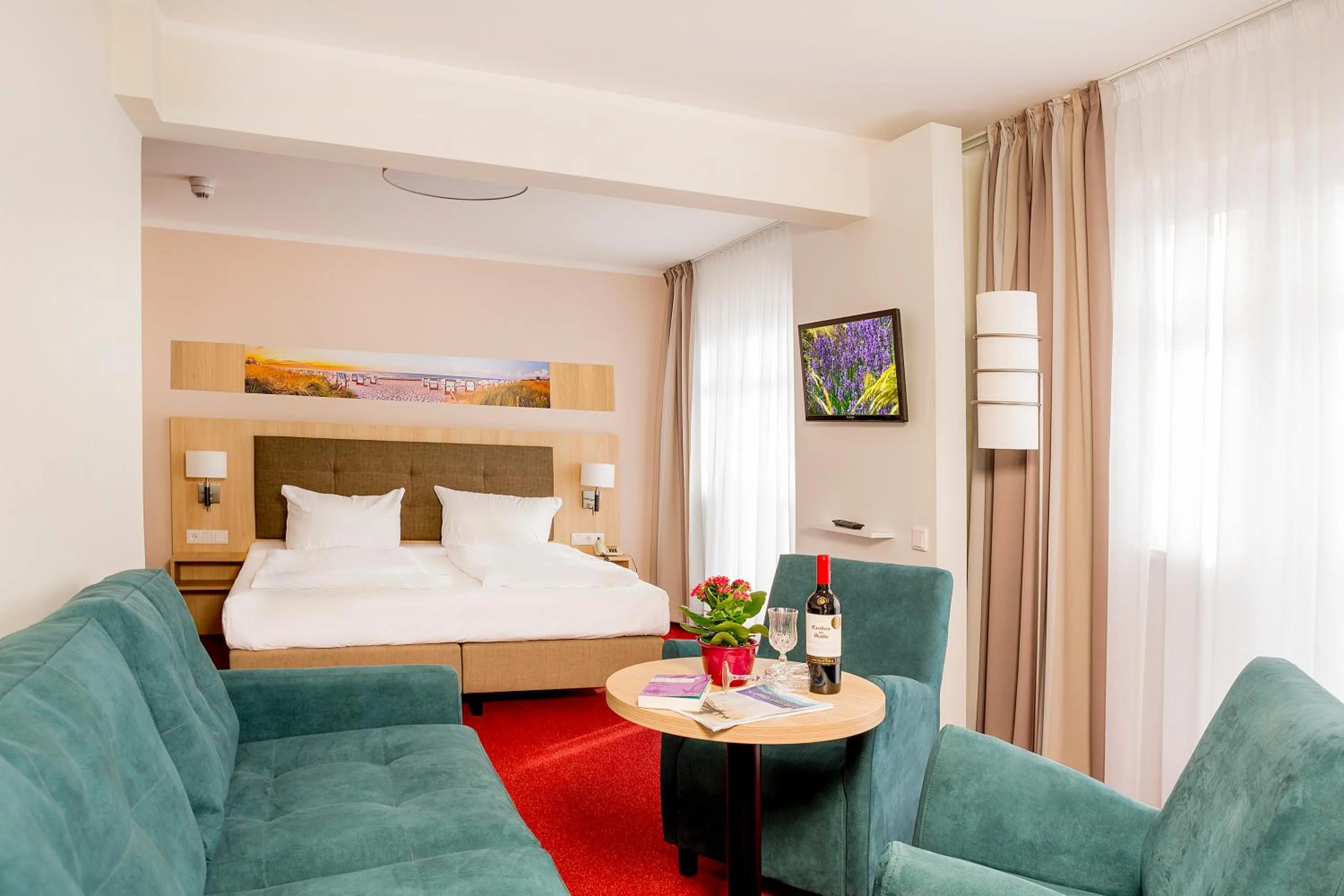 Bed in Garni Eden Hotels