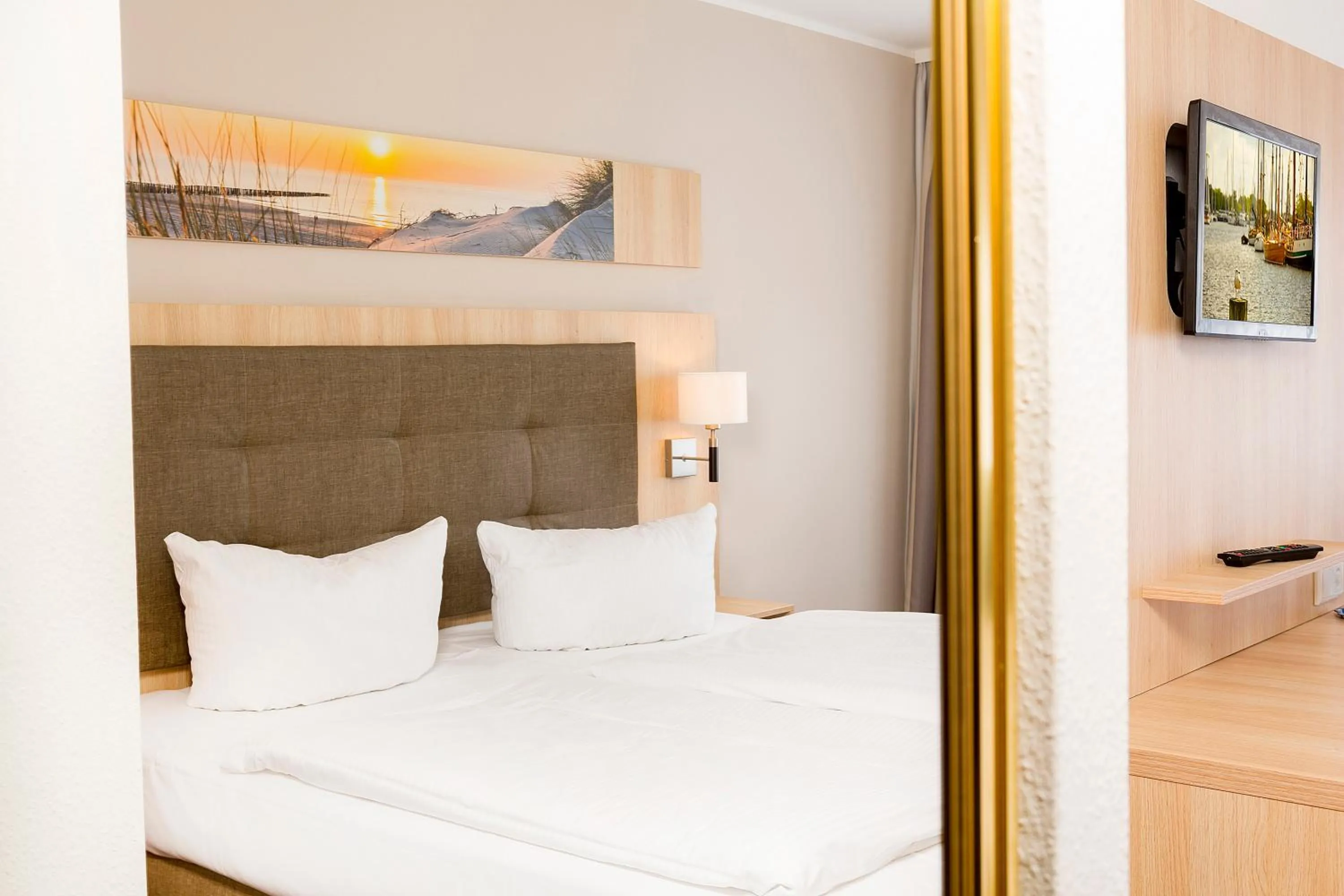 Bed in Garni Eden Hotels