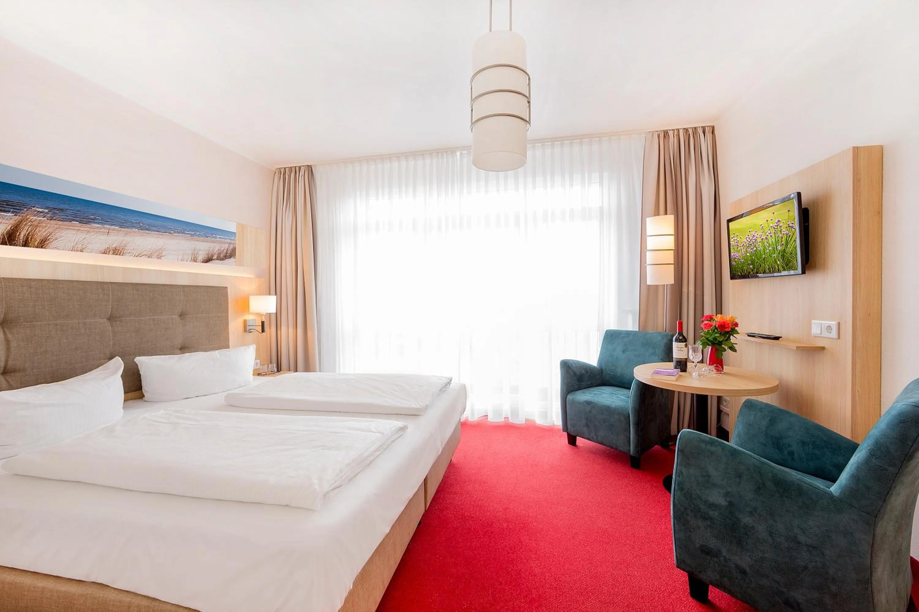 Bed in Garni Eden Hotels