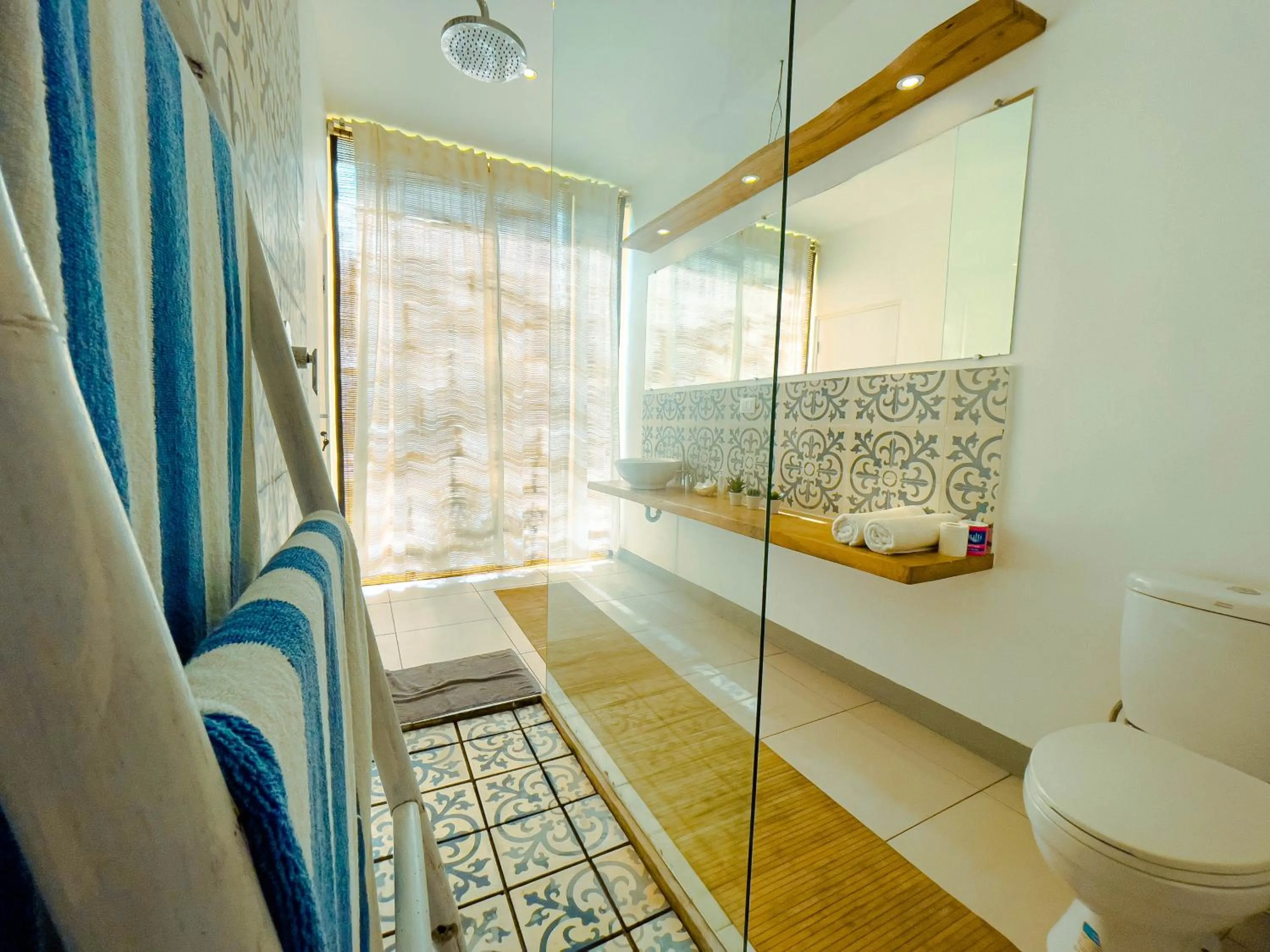 Shower in Villa Samalas Resort and Restaurant