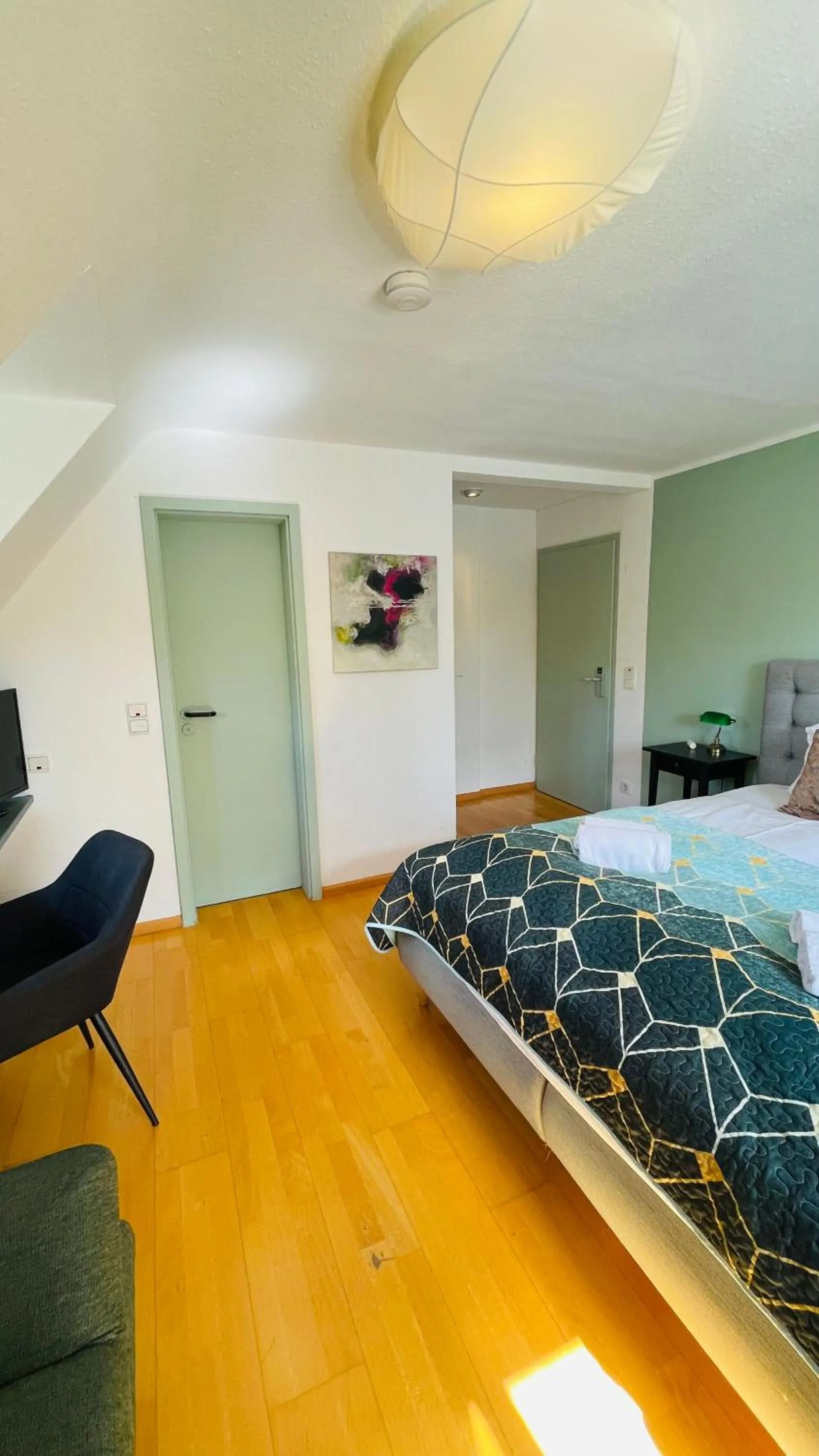 Photo of the whole room, Bed in Hotel & Restaurant Grüner Baum Merzhausen