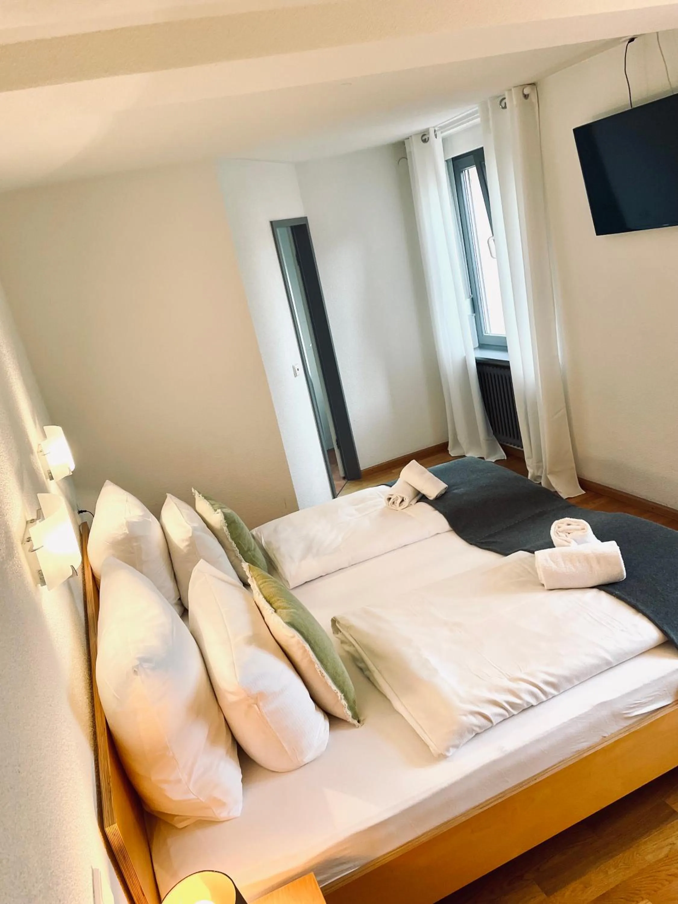 Photo of the whole room, Bed in Hotel & Restaurant Grüner Baum Merzhausen