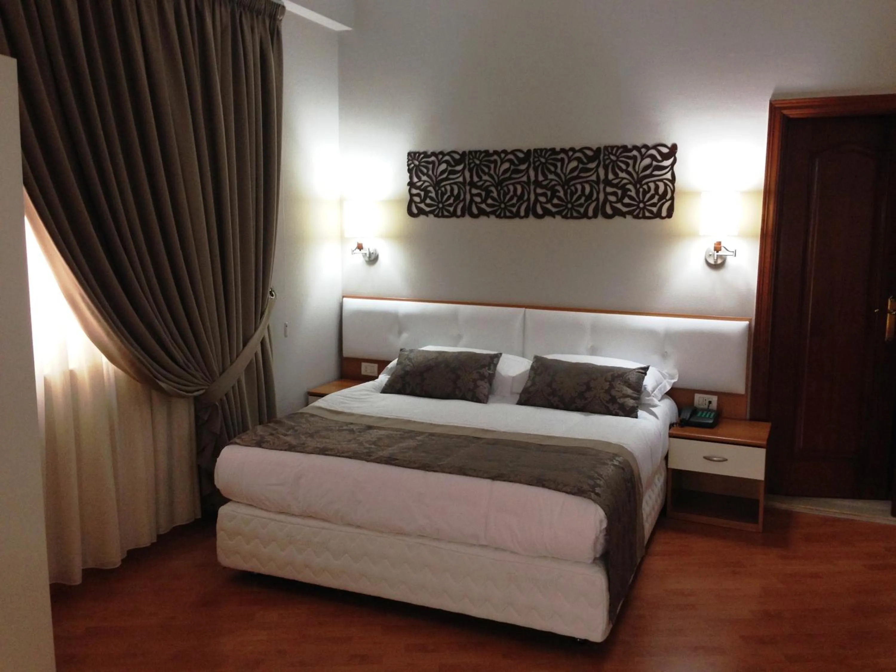 Bed in Hotel Arvi