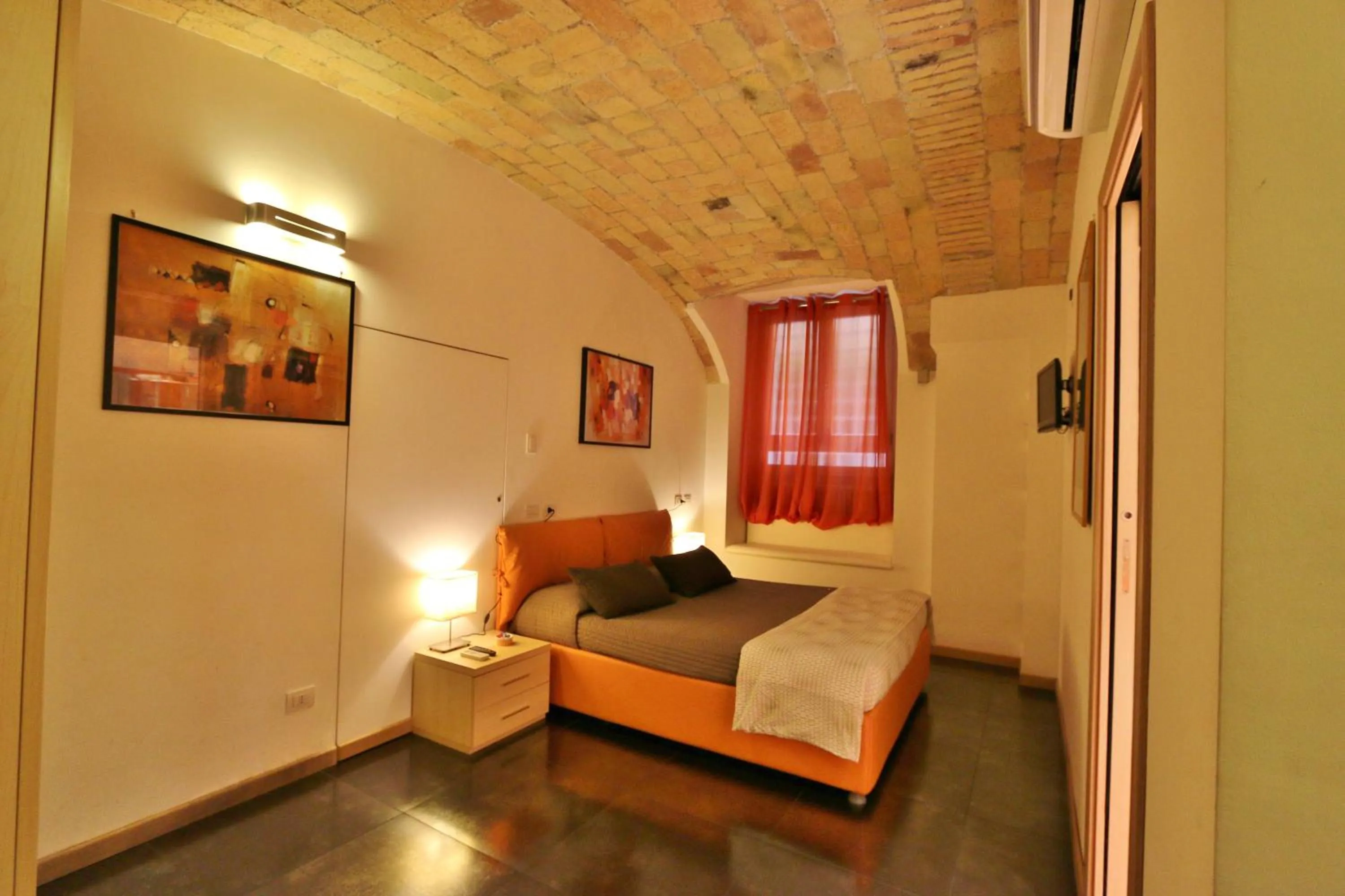 Photo of the whole room, Bed in Residenza Adriana