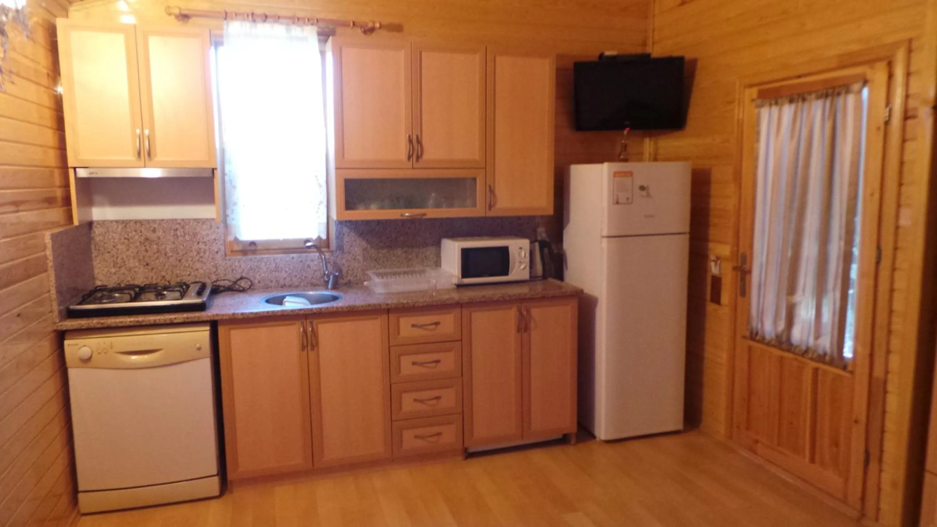 Kitchen or kitchenette in Mercan Bungalow