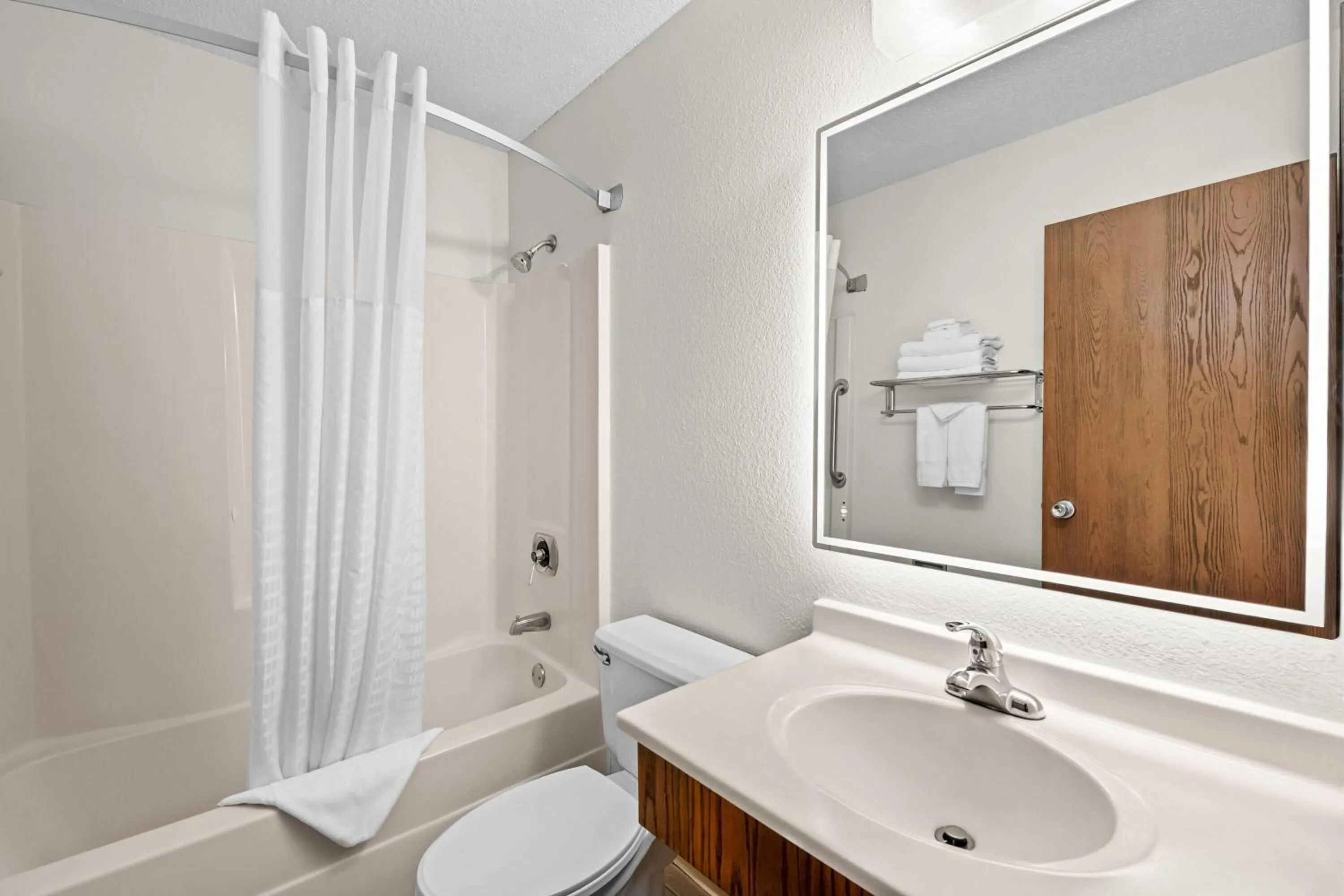 Bathroom in Super 8 by Wyndham Alexandria MN