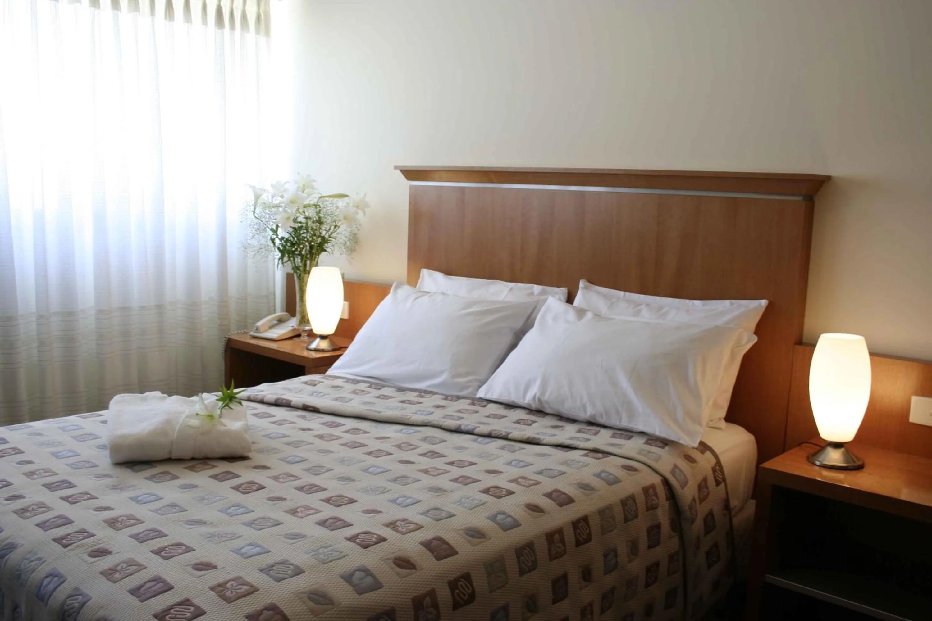 Bed in Ariston Hotel