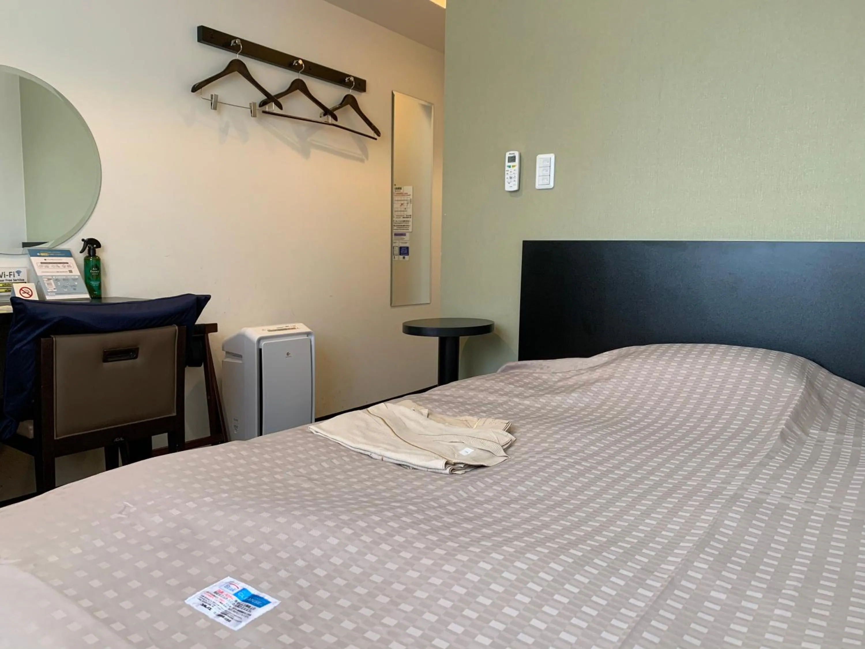 Photo of the whole room, Bed in Urbain Hiroshima Central