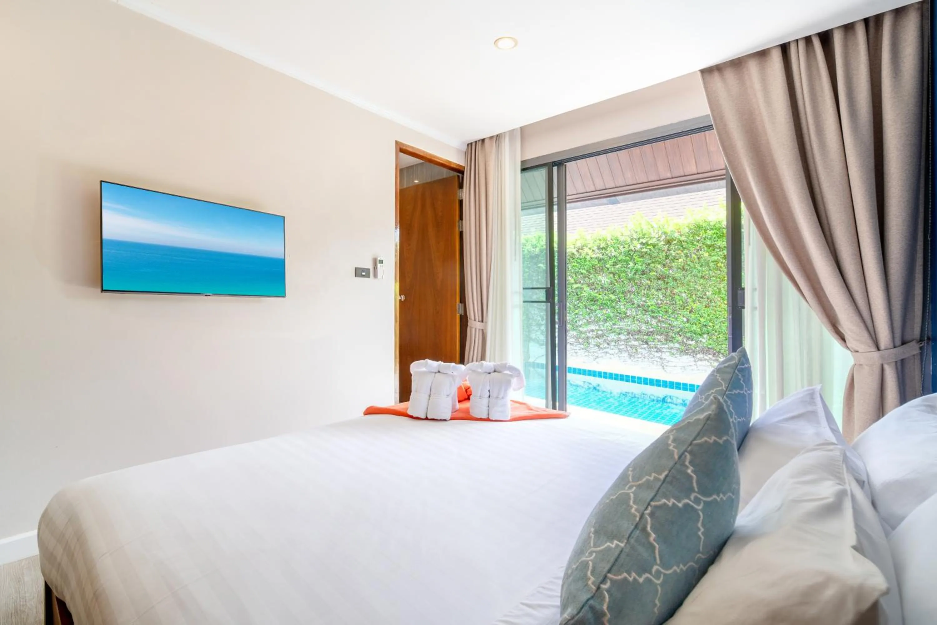 Bed in The Kiri Villas Resort