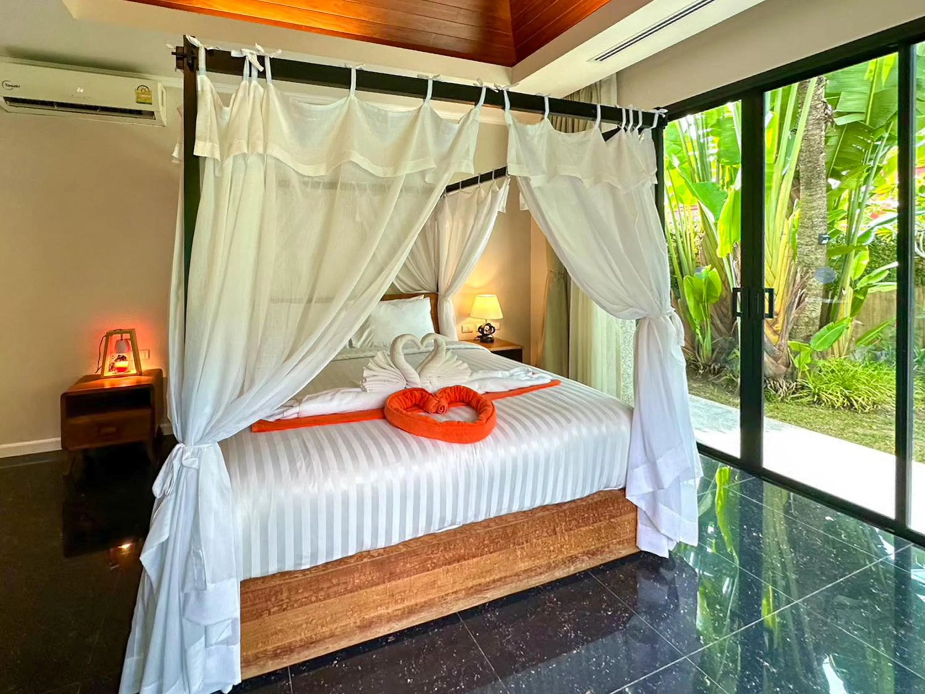 Bed in The Kiri Villas Resort