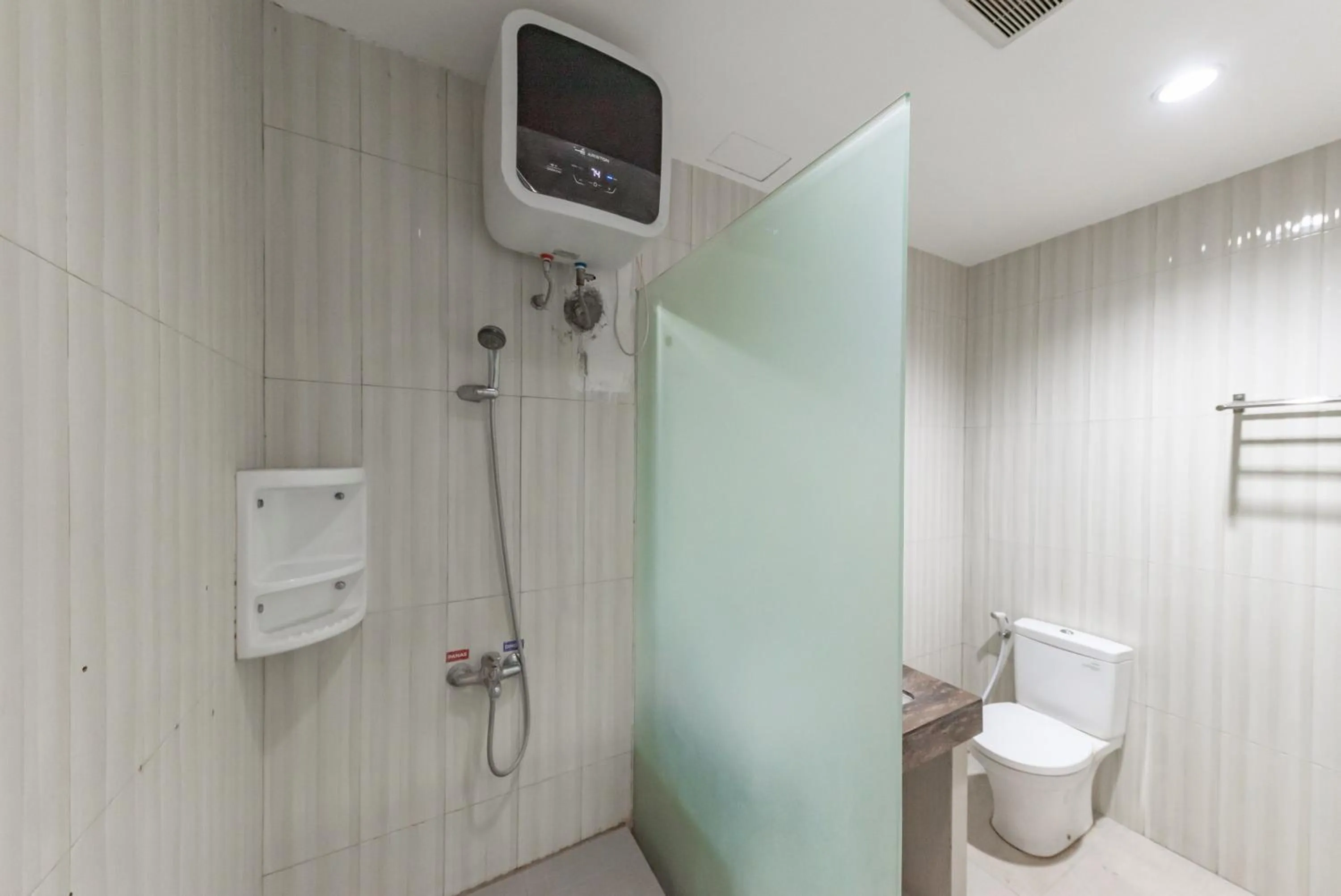 Bathroom in Sans Vibes Hotel Malabar