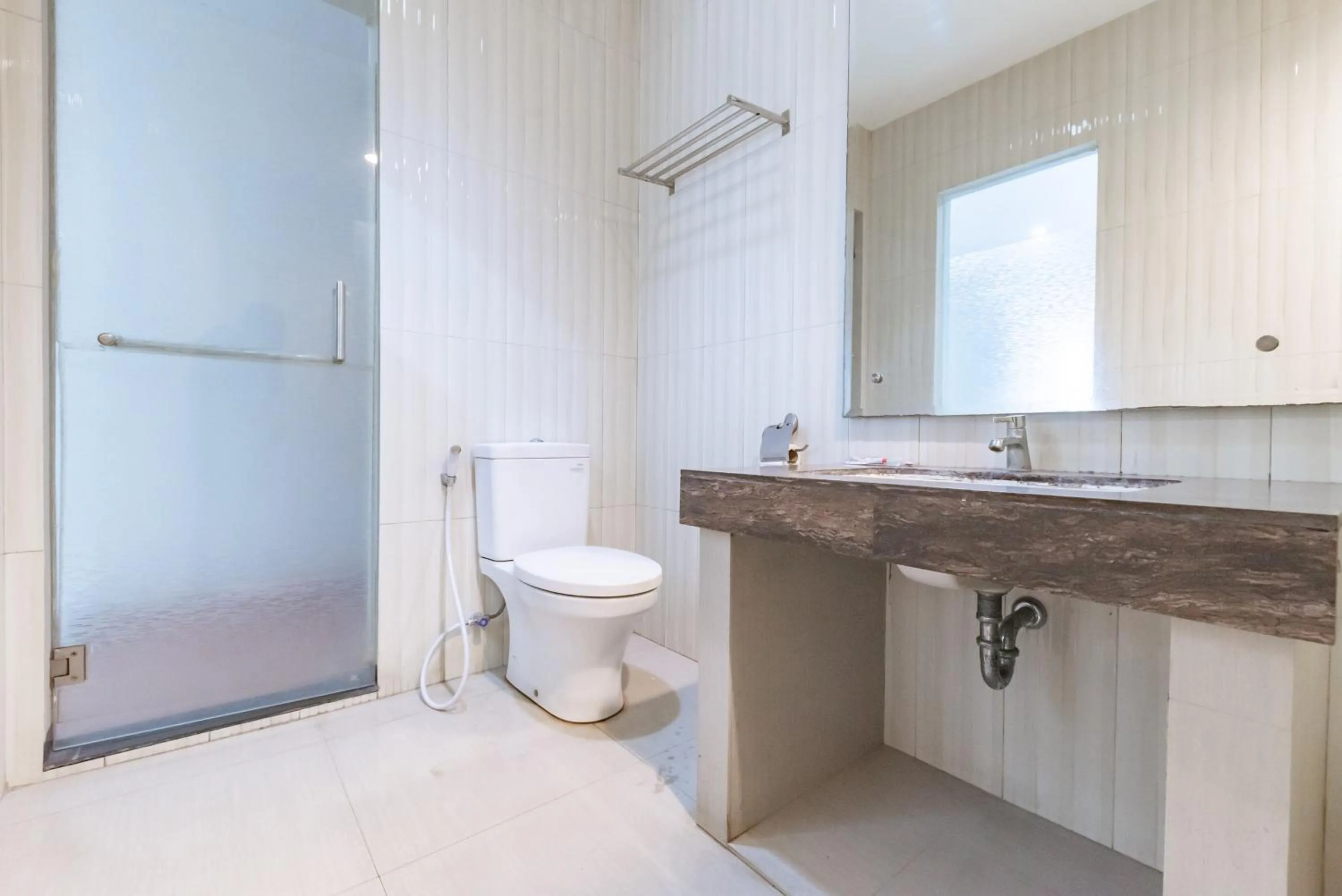 Bathroom in Sans Vibes Hotel Malabar