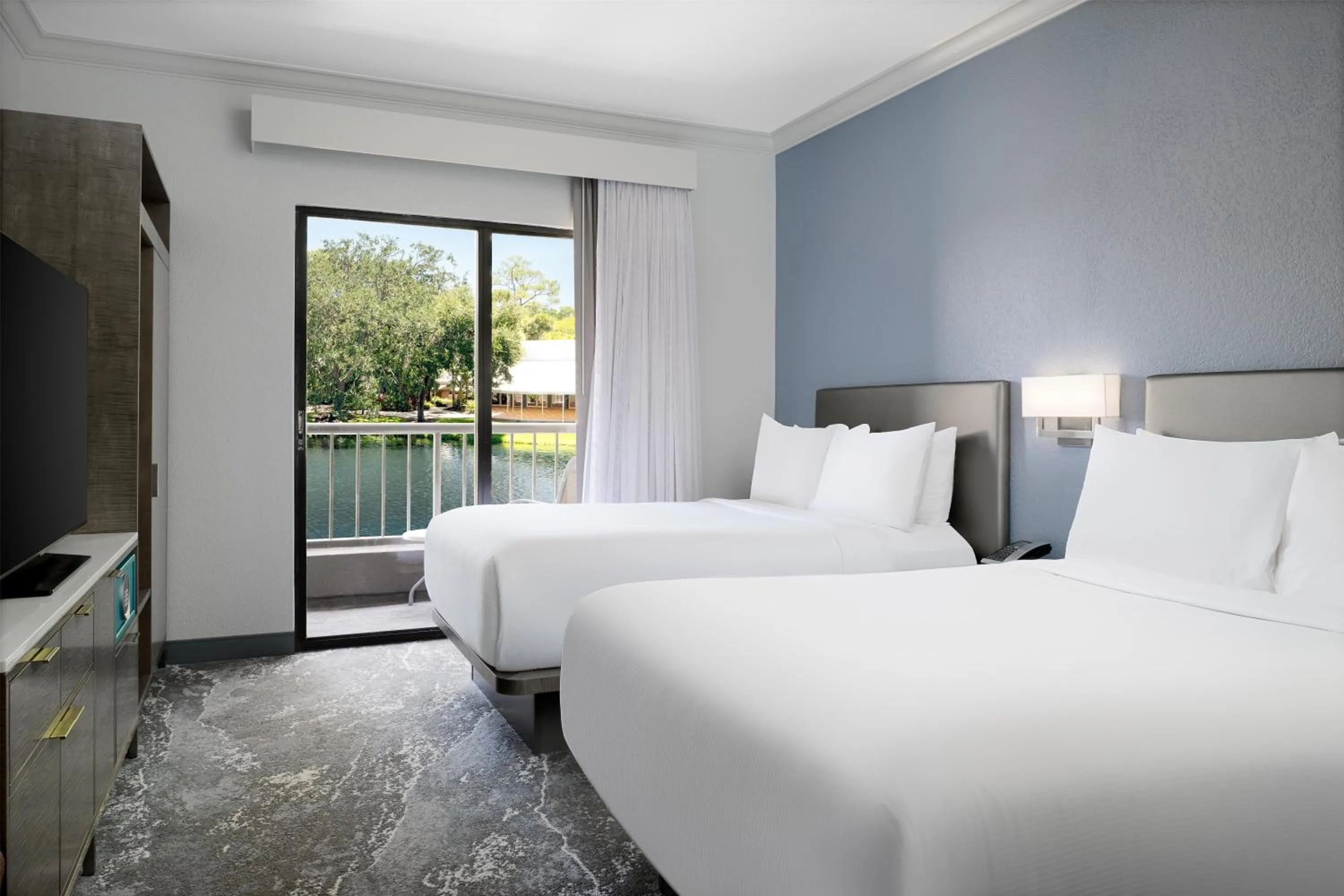 Bed in Hilton Boca Raton Suites