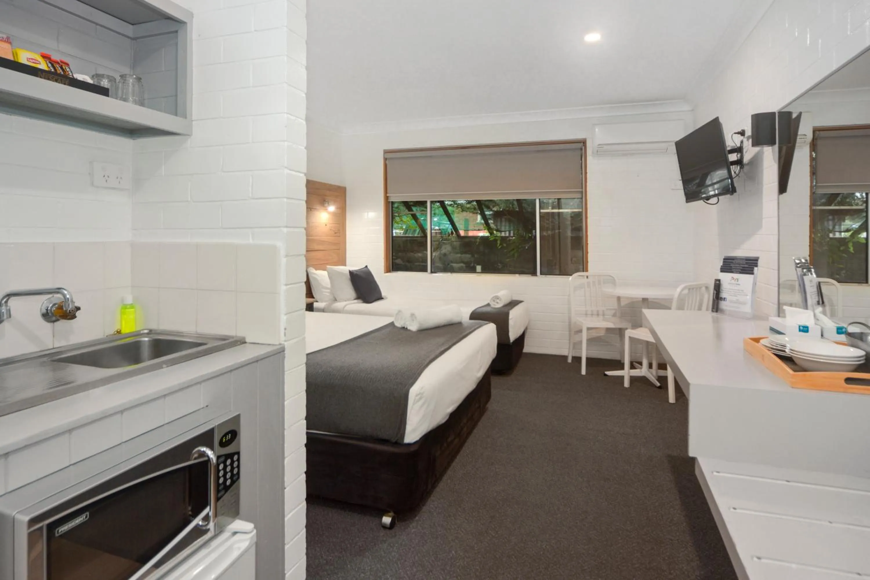 Bed in Pleasant Way River Lodge