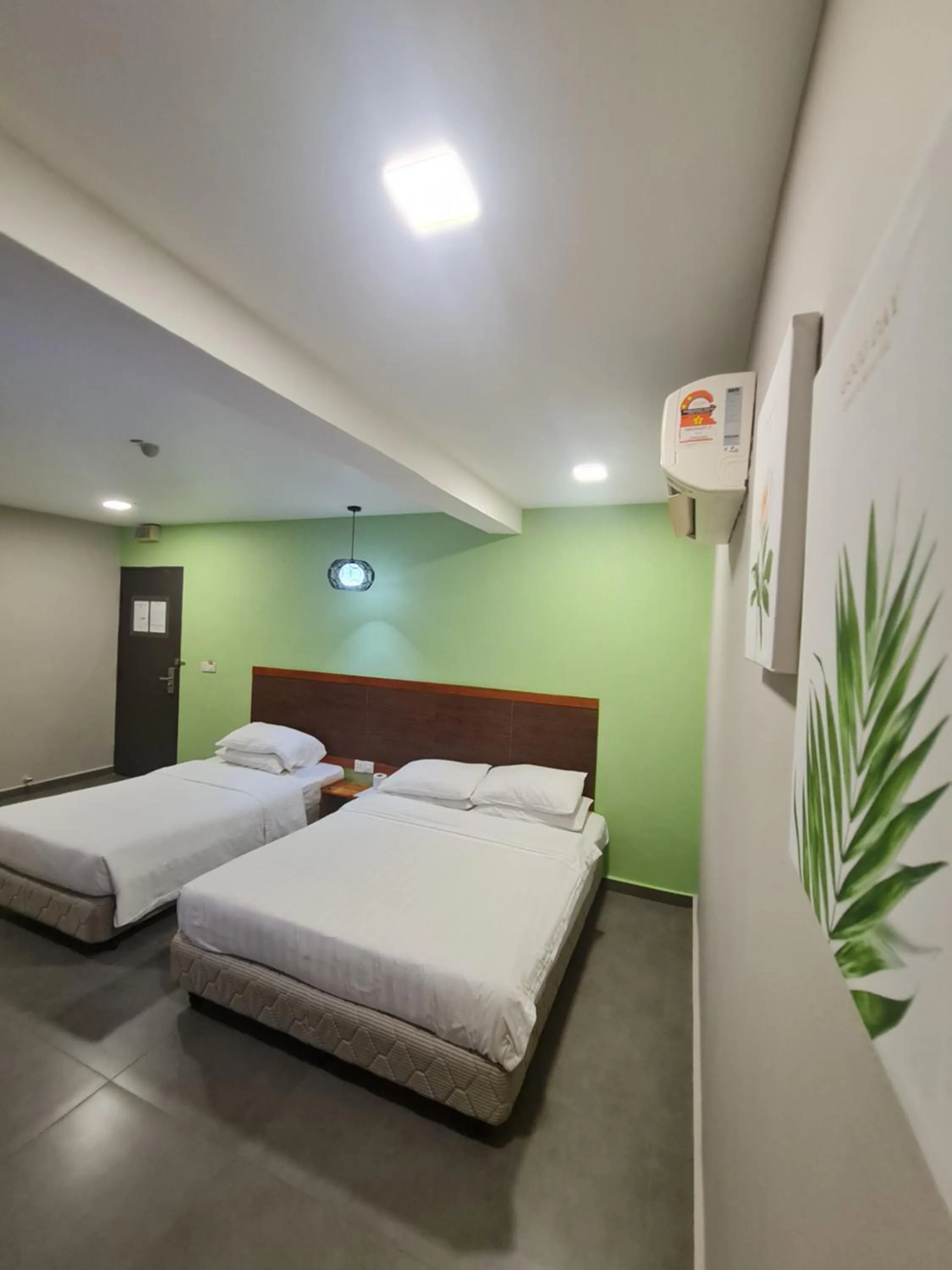 Bed in Hotel Bestari