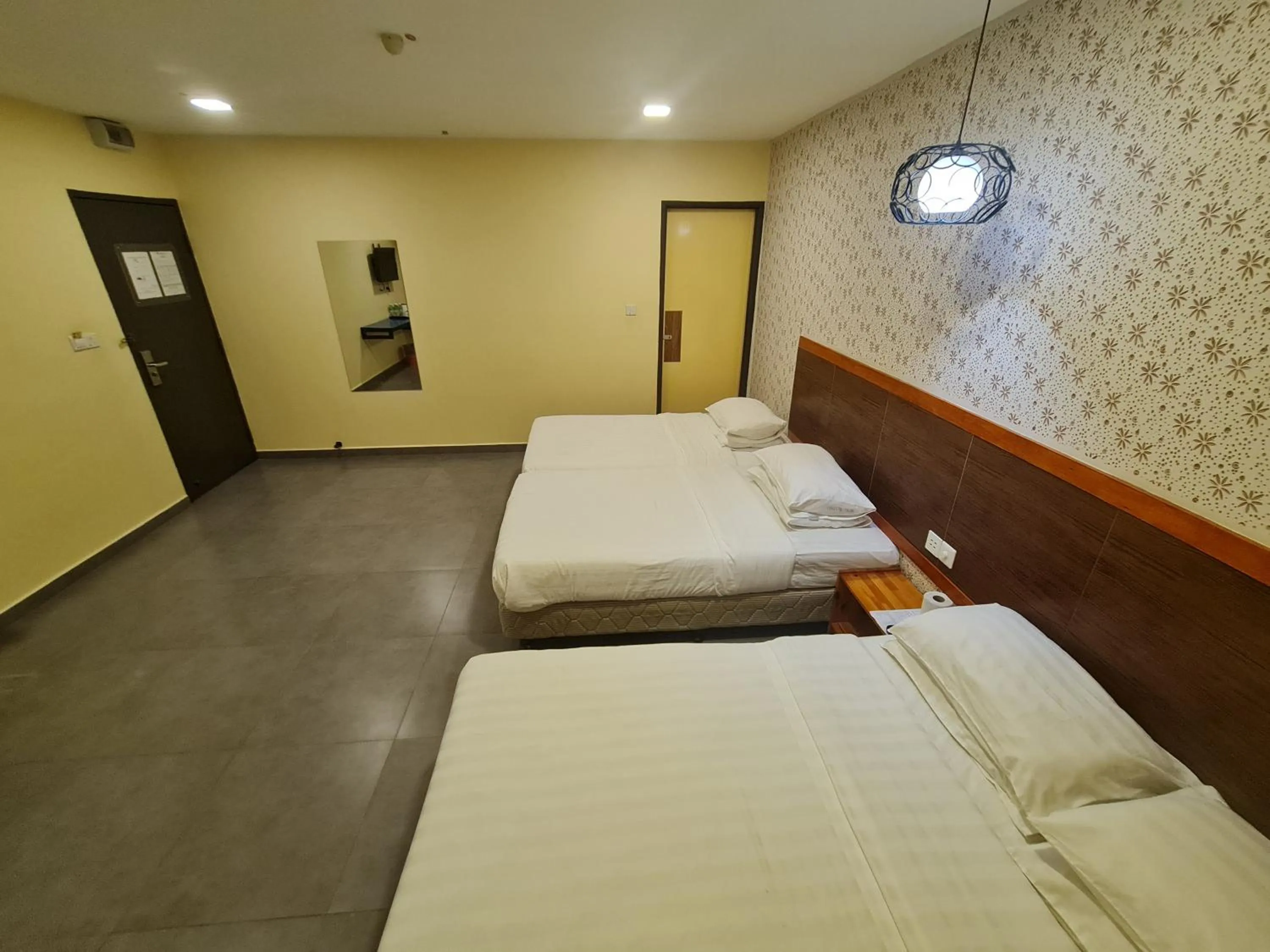 Bed in Hotel Bestari