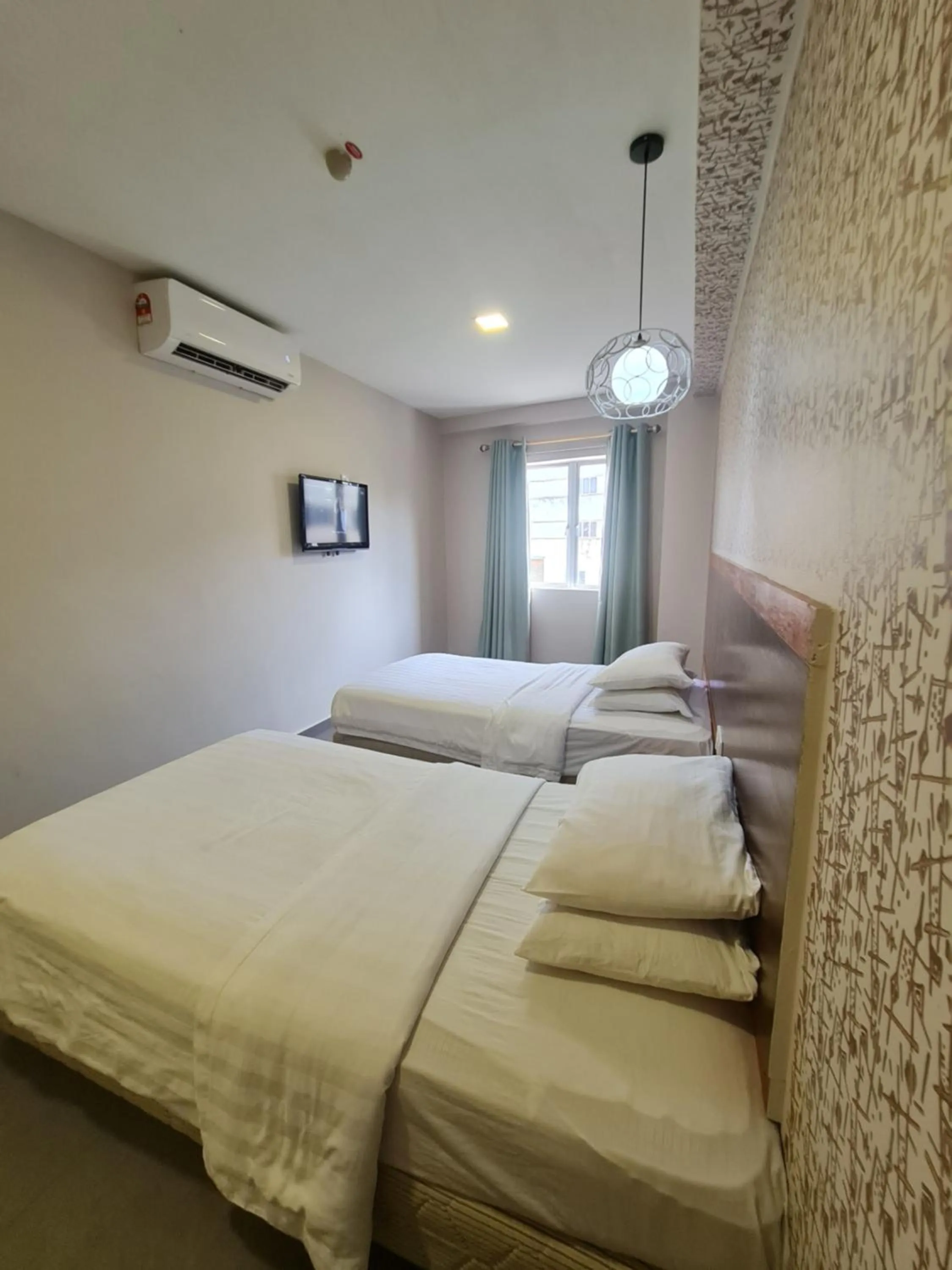 Bed in Hotel Bestari