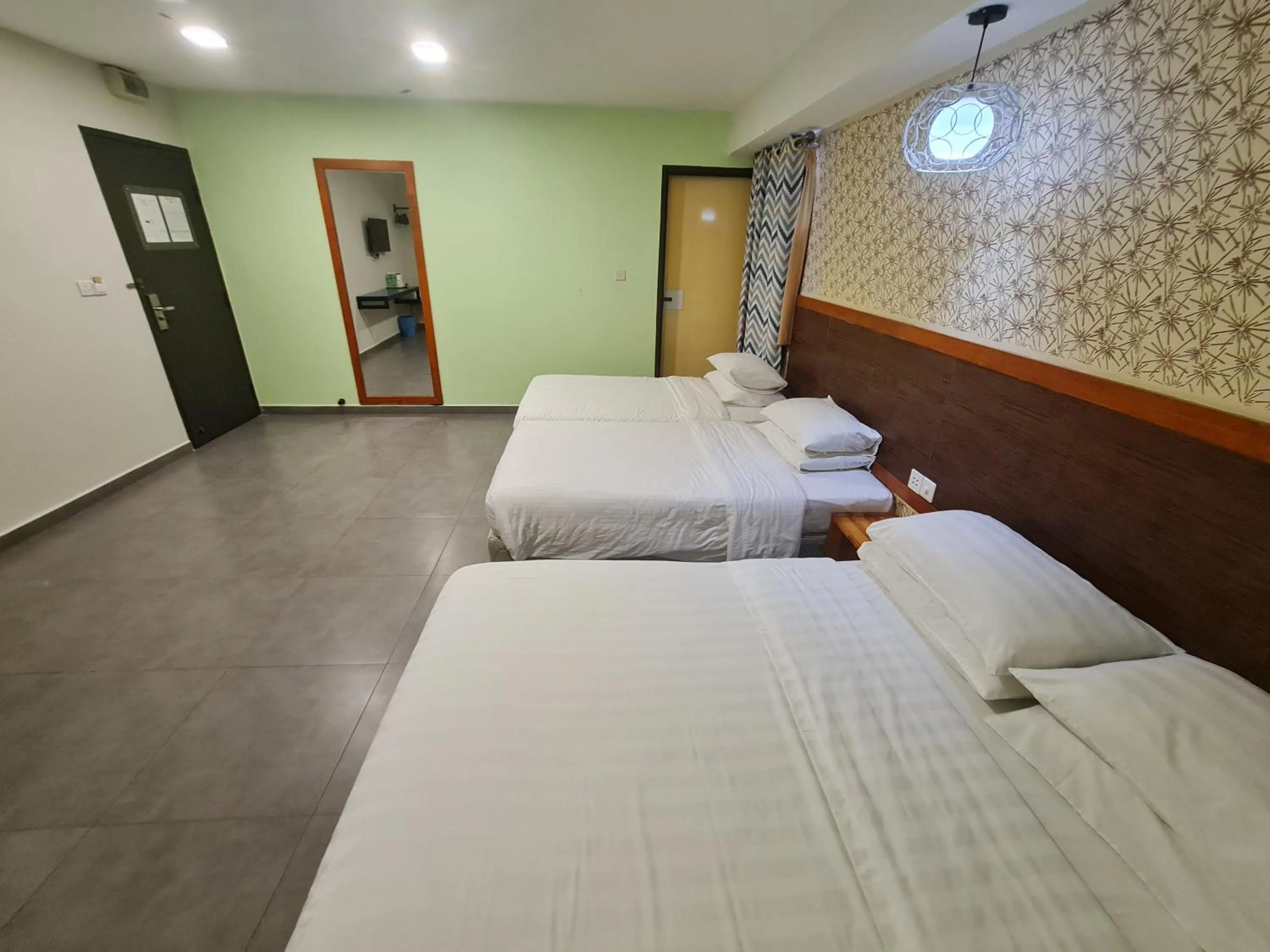 Bed in Hotel Bestari