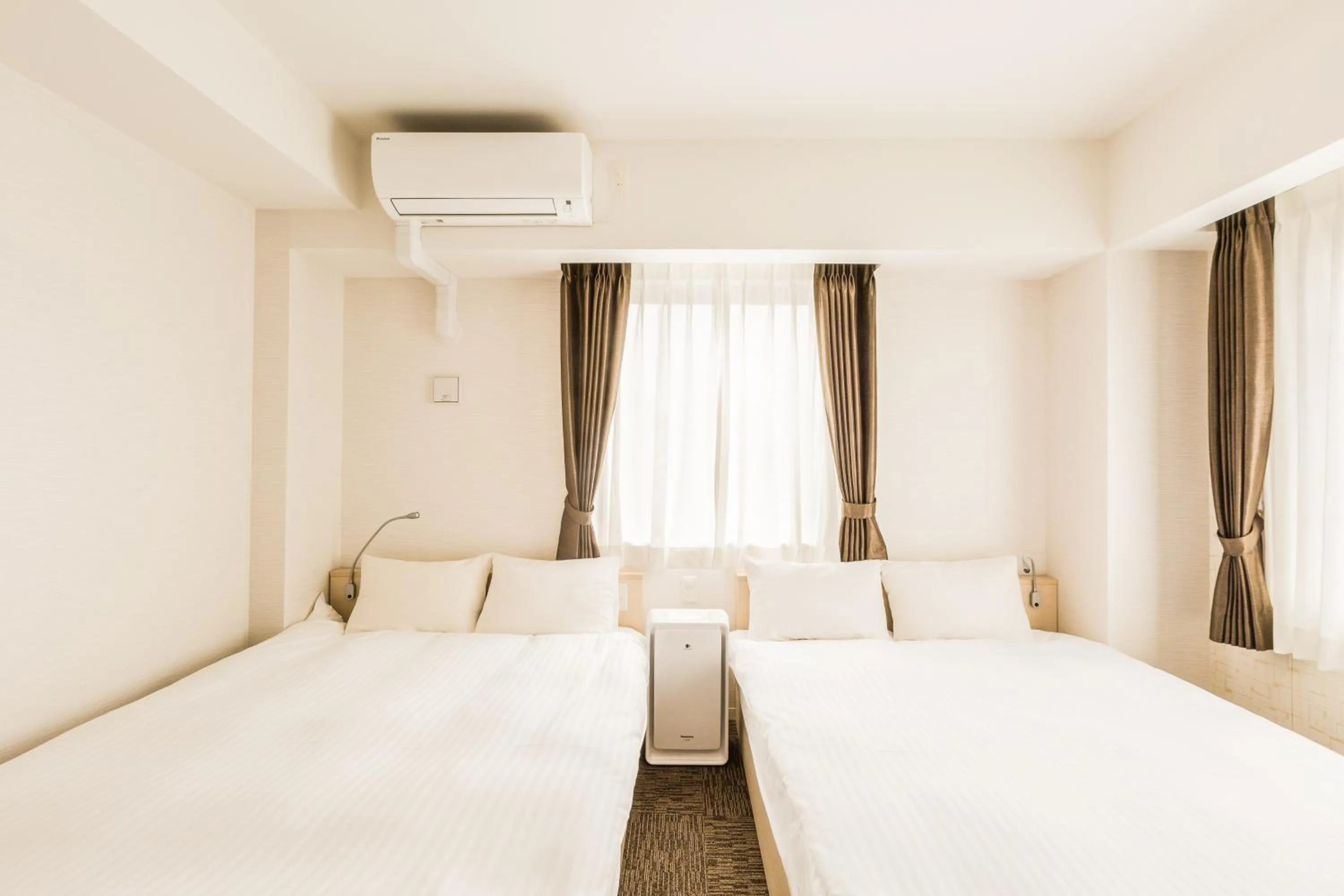 Photo of the whole room, Bed in EIWA PLACE HOTEL Hakata