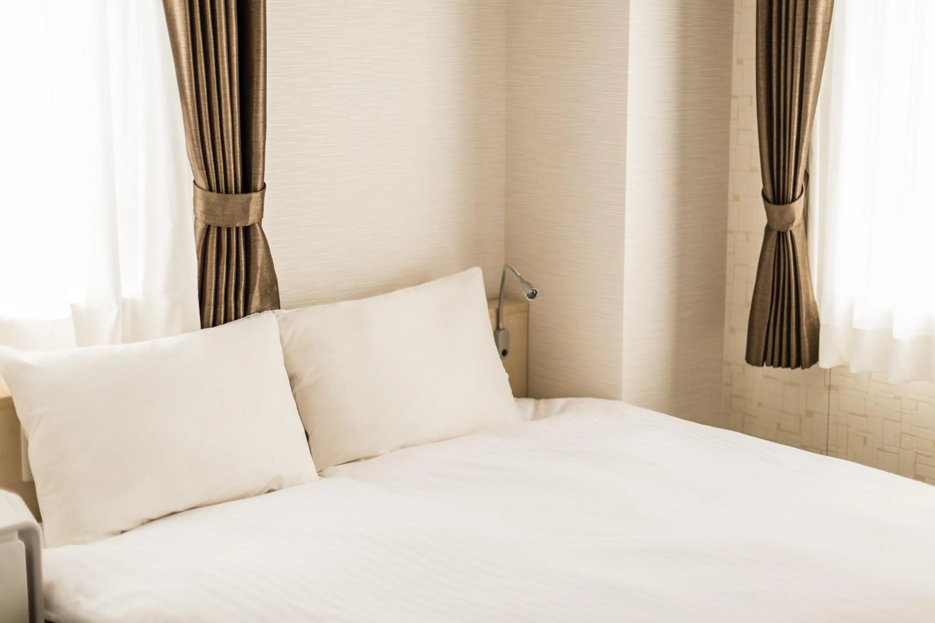 Photo of the whole room, Bed in EIWA PLACE HOTEL Hakata