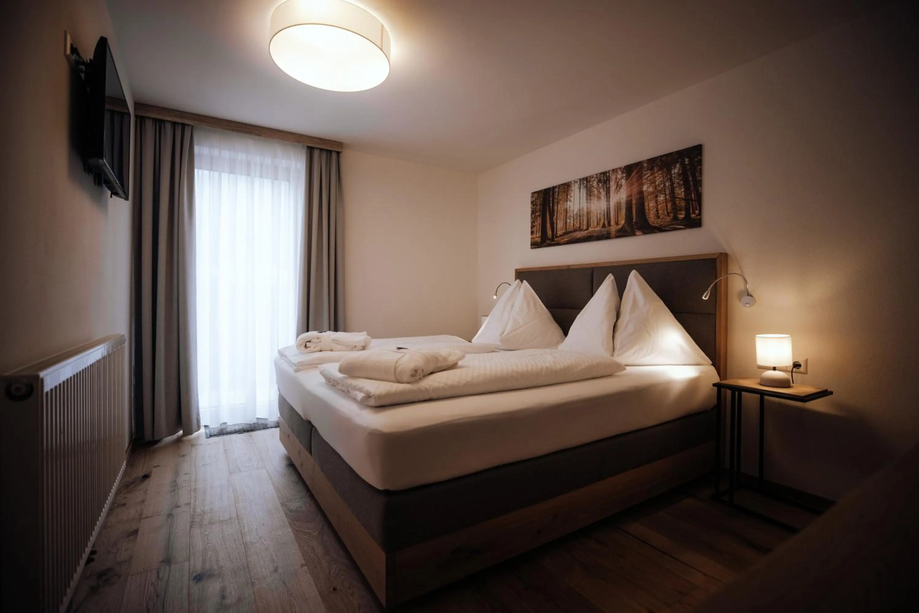 Photo of the whole room, Bed in FORSTAUERWiRT Hotel & Restaurant
