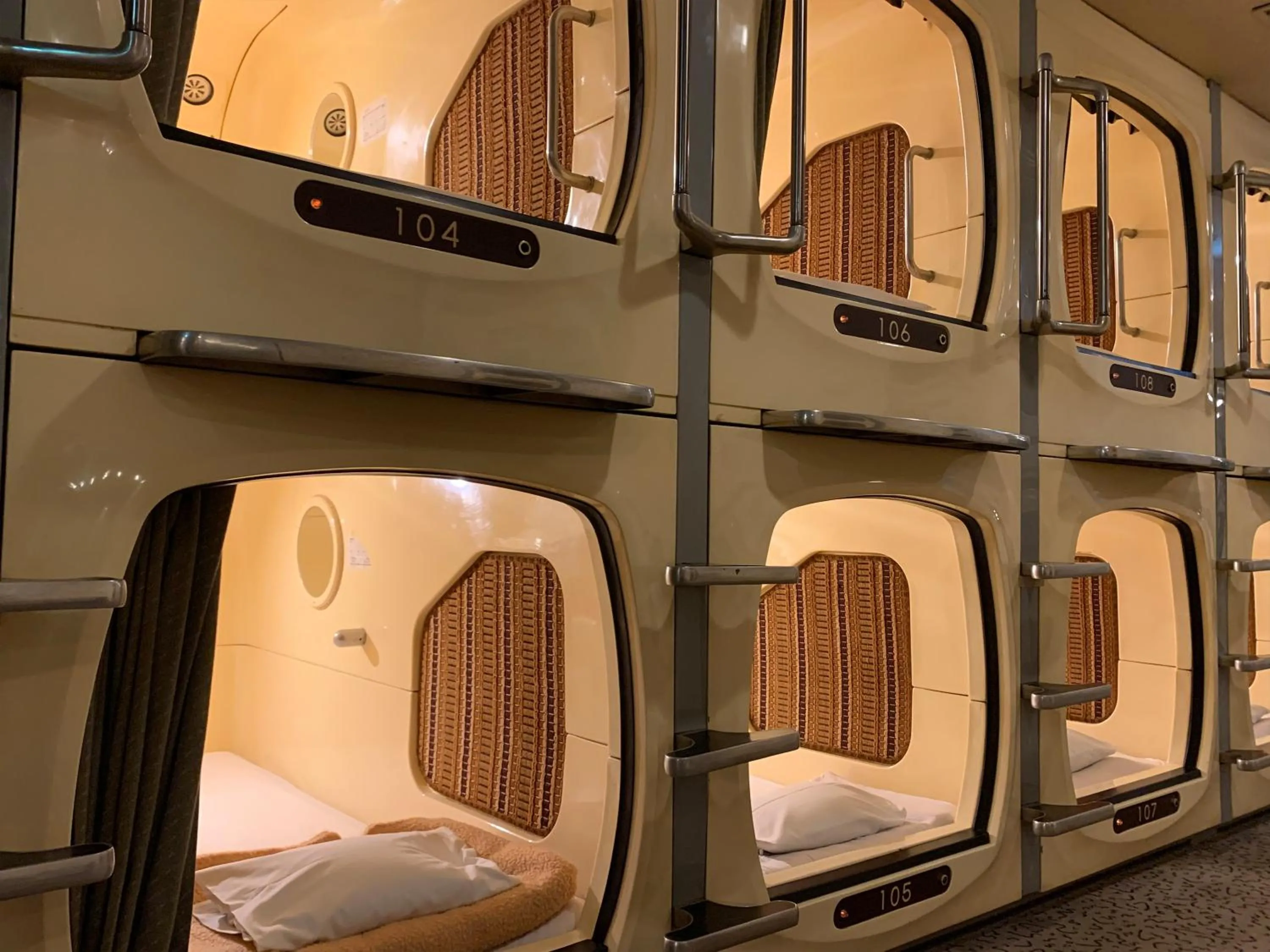 Bed in Funabashi Grand Sauna and Capsule Hotel