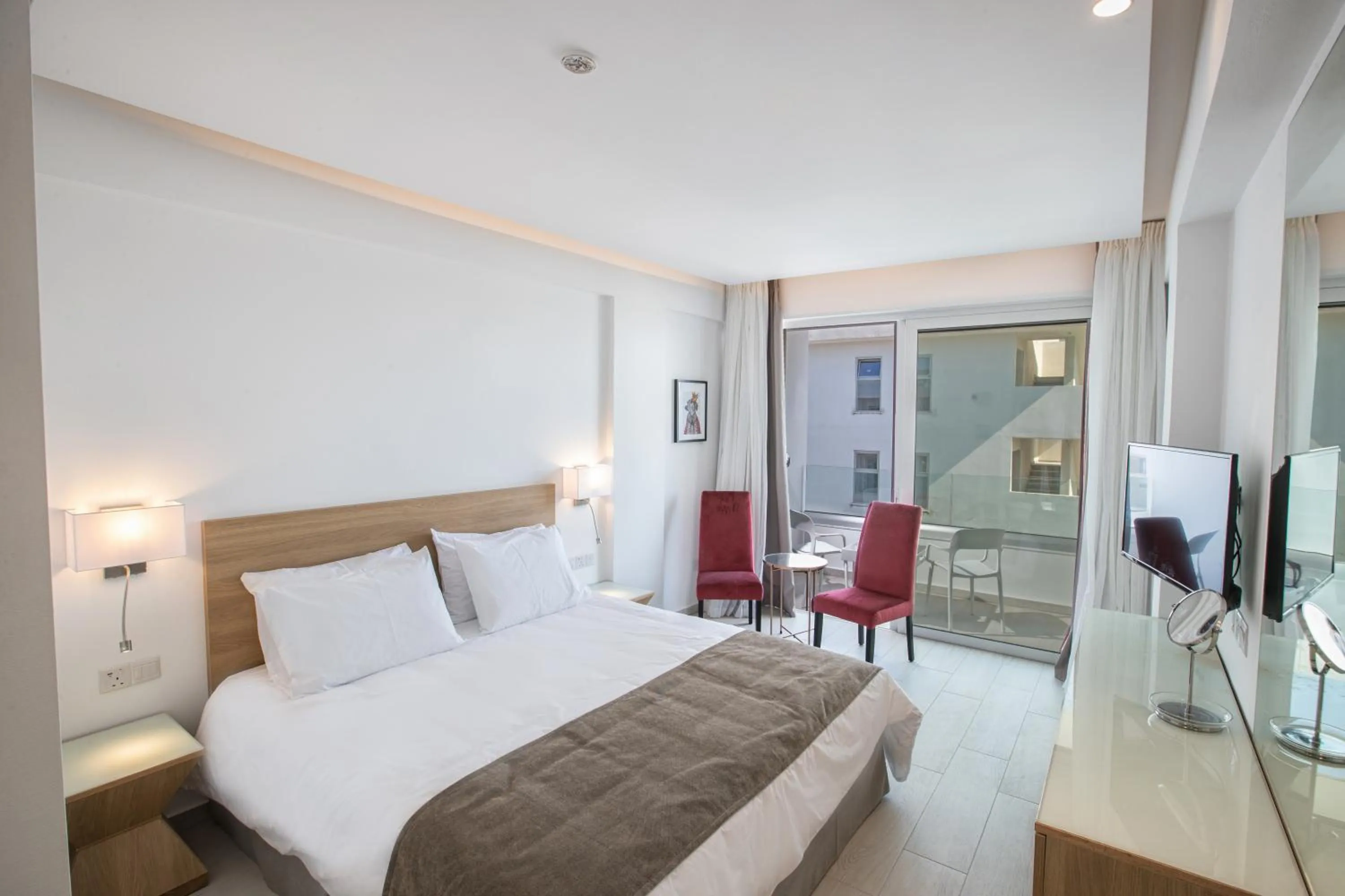 Photo of the whole room, Bed in Kokkinos Boutique Hotel