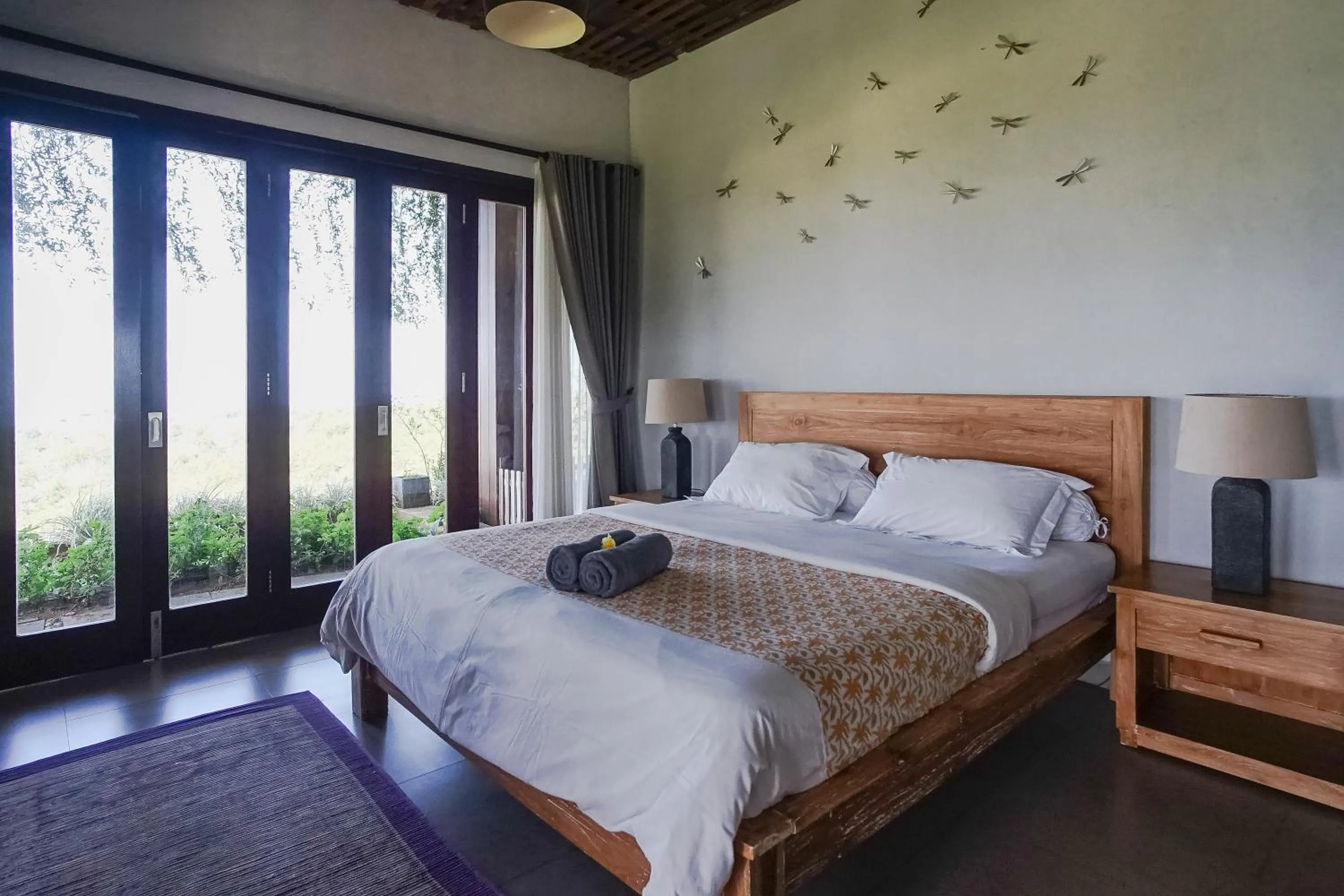 Bed in The Ocean Views Luxury Villas & Apartment