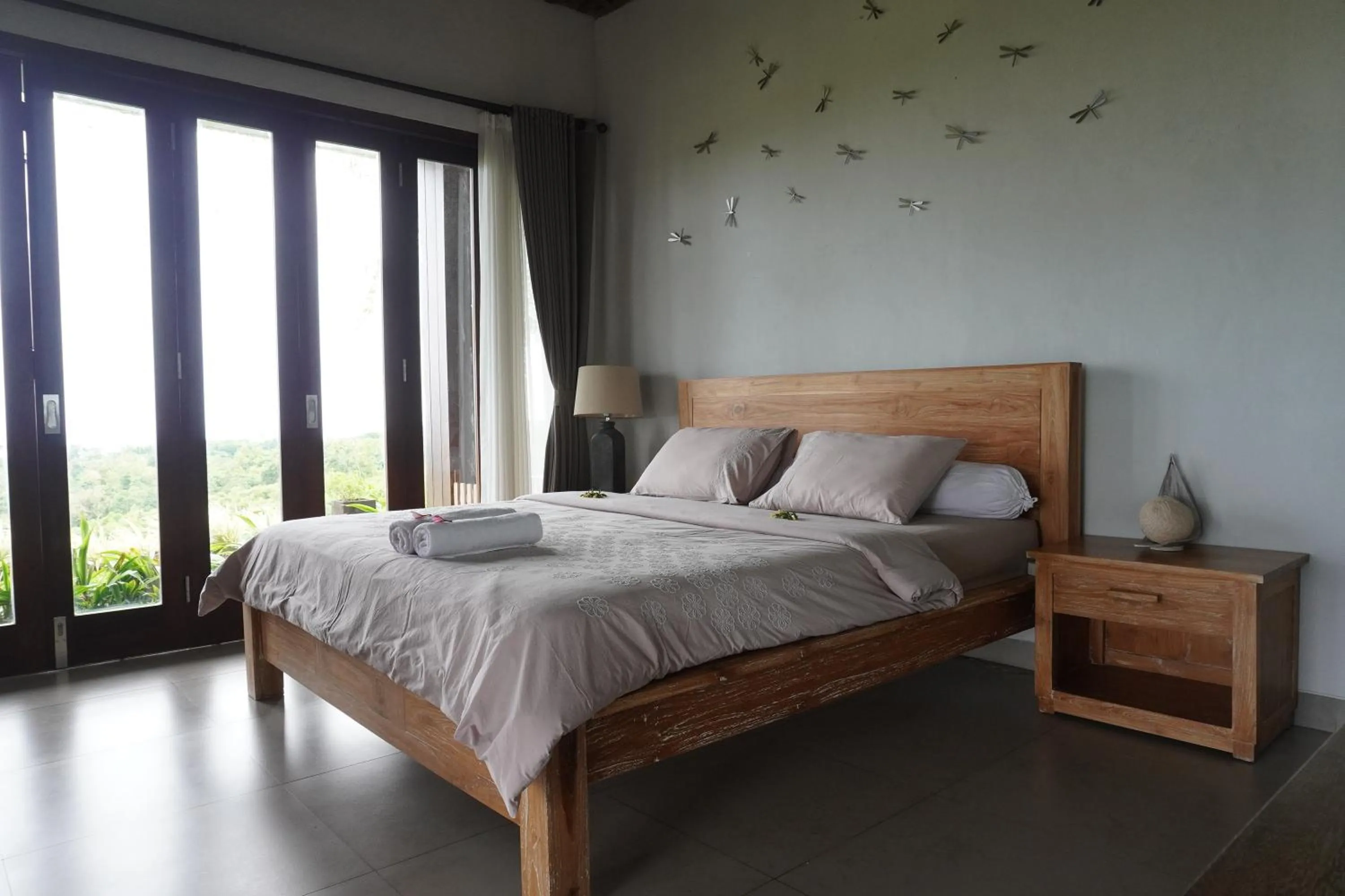 Bed in The Ocean Views Luxury Villas & Apartment