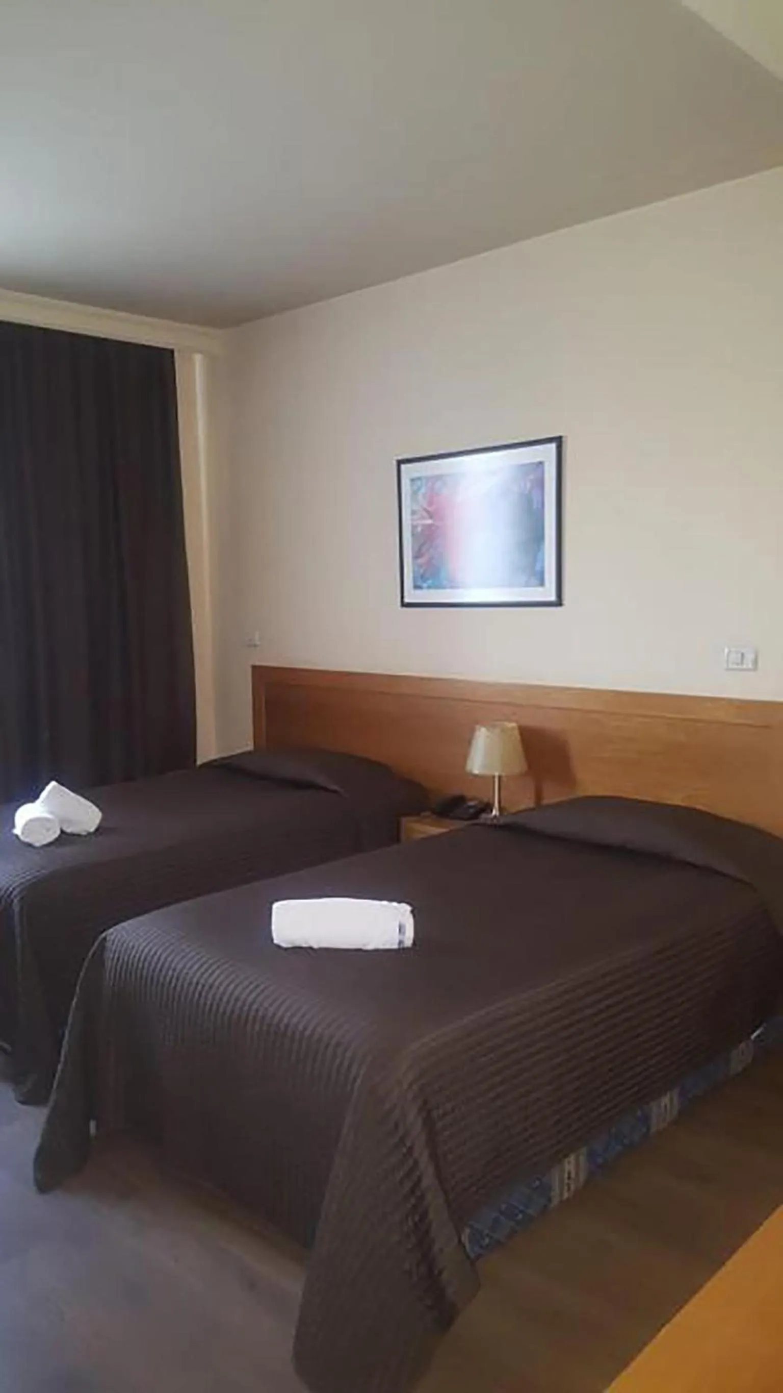 Living room, Bed in Hotel Doro City