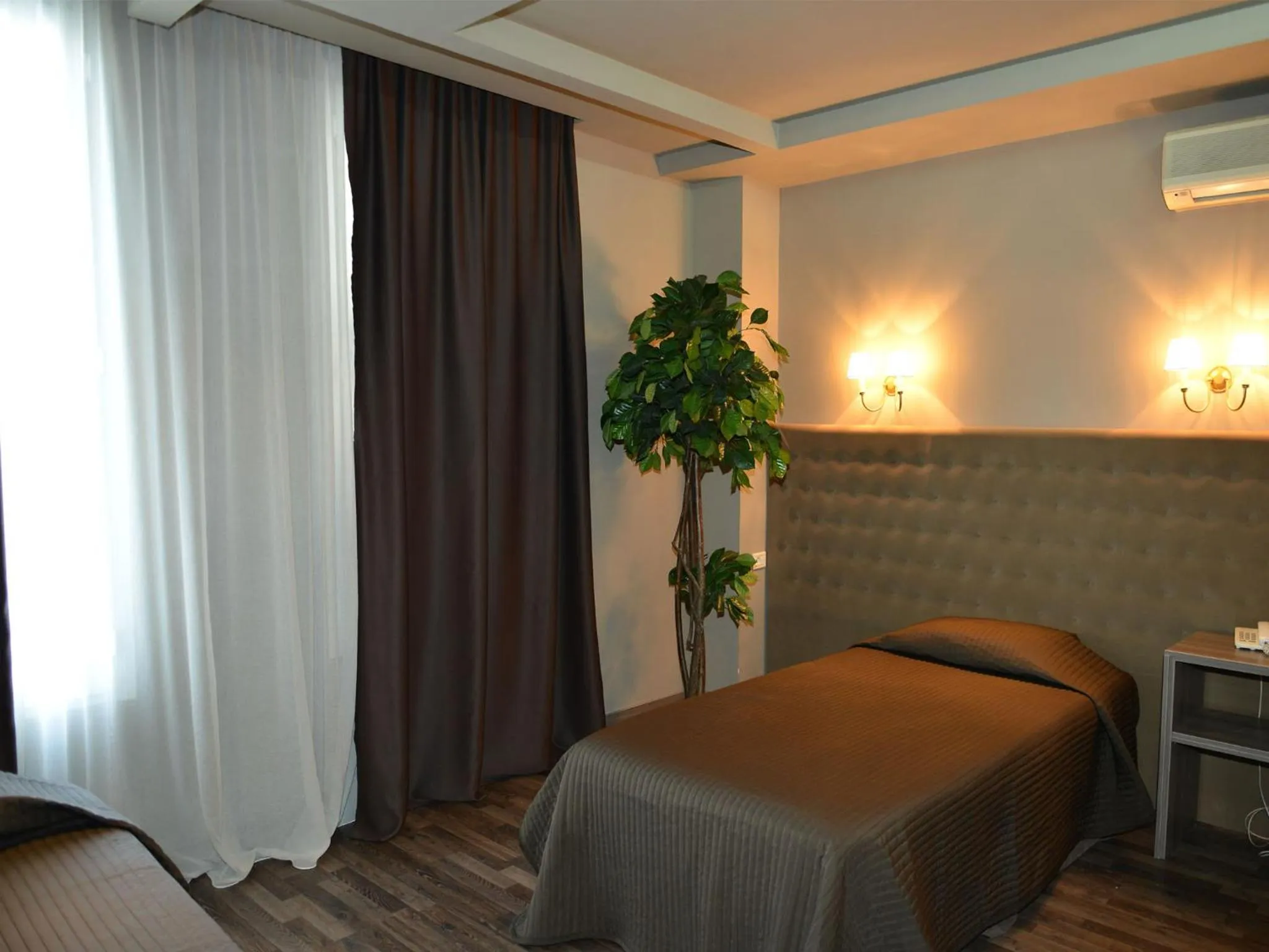 Living room, Bed in Hotel Doro City