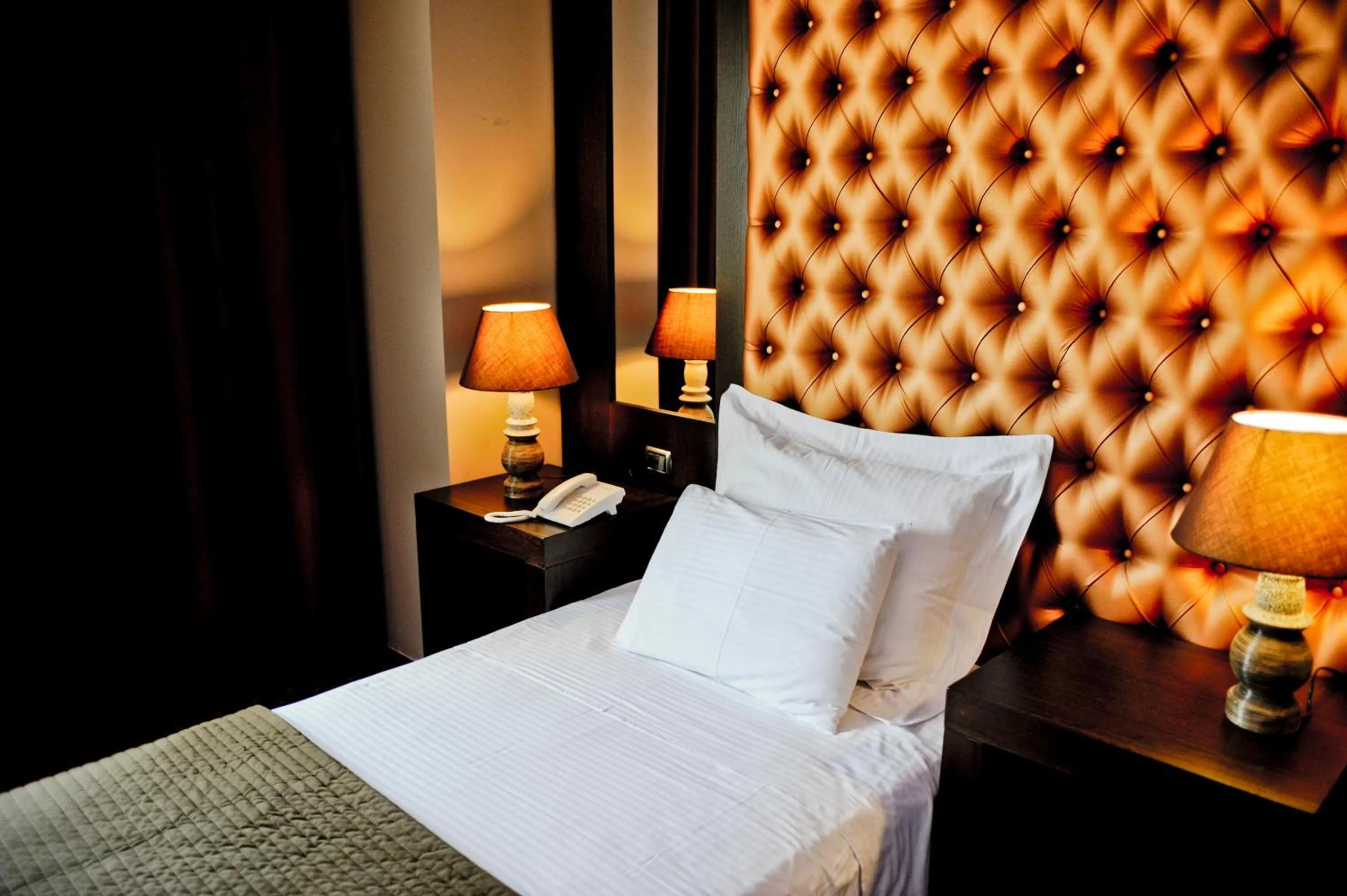 Living room, Bed in Hotel Doro City