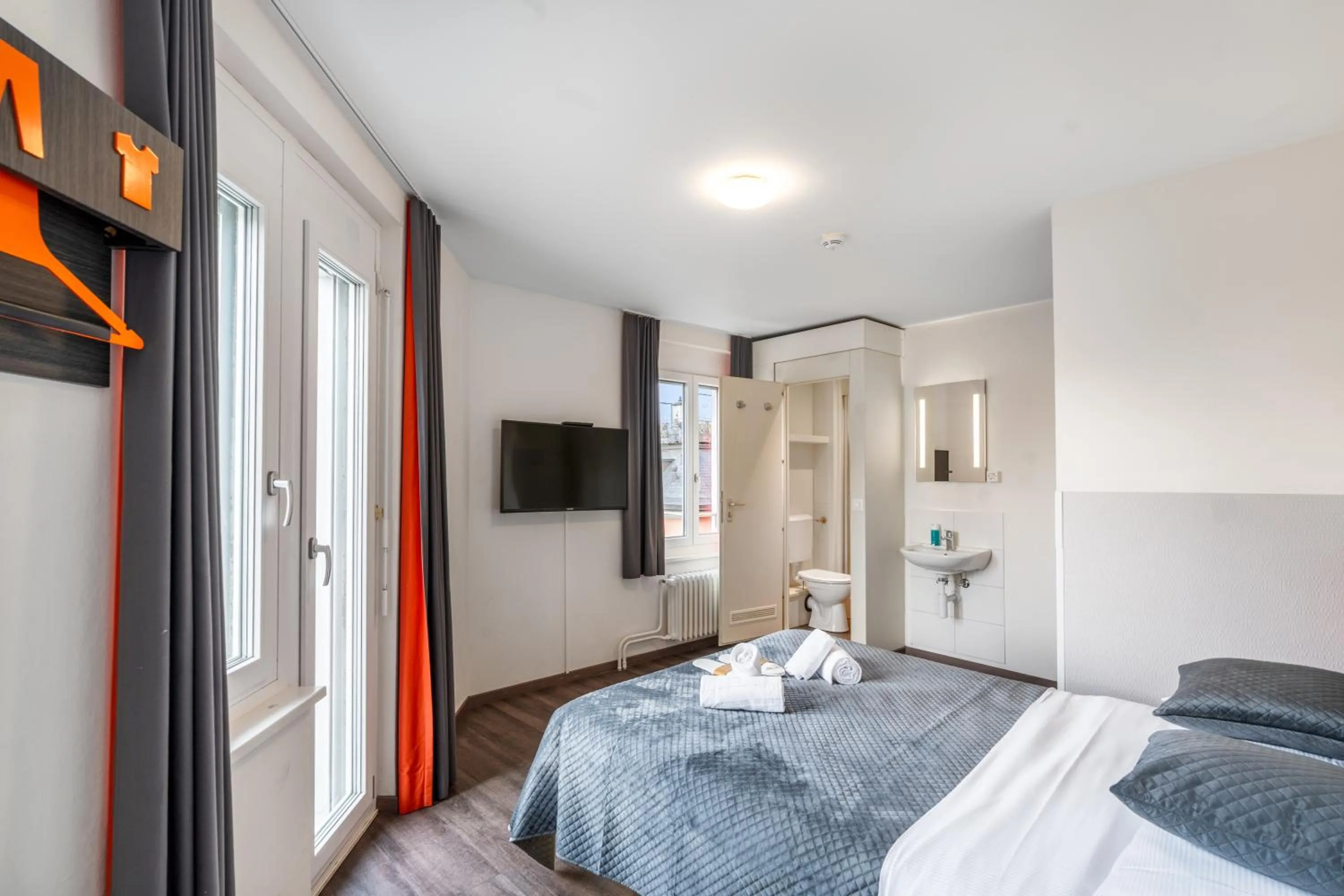 Photo of the whole room, Bed in Delta City Hotels - Self check-in