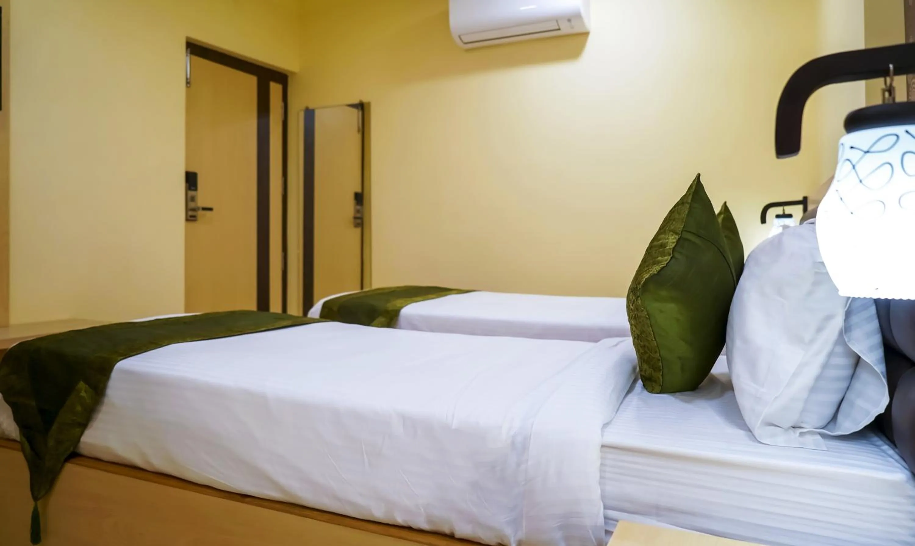 Bed in Treebo Oasis, Laxmisagar